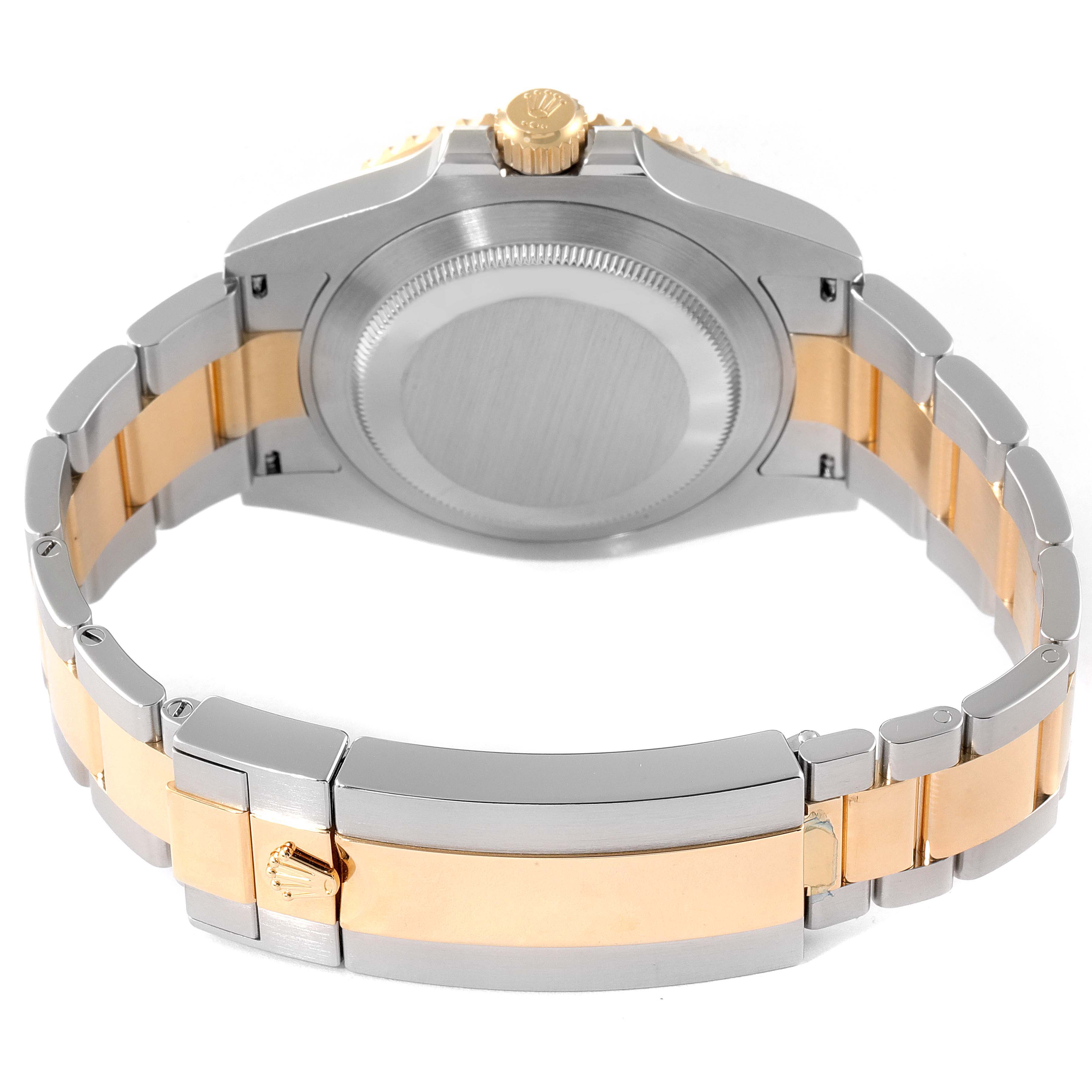 The image shows the backside and bracelet of a Rolex Submariner 126613 Men's Steel and Gold (two tone) Black Dial 126613 Men's Steel and Gold (two tone) Black Dial watch, featuring a two-tone metal design.