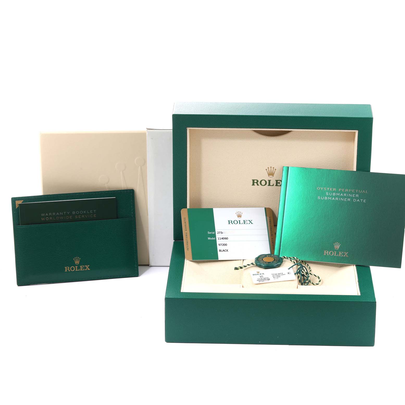 The image shows the packaging, booklet, warranty card, and accessories for a Rolex Submariner 114060 Men
s Stainless Steel Black Dial 114060 Men
s Stainless Steel Black Dial watch.