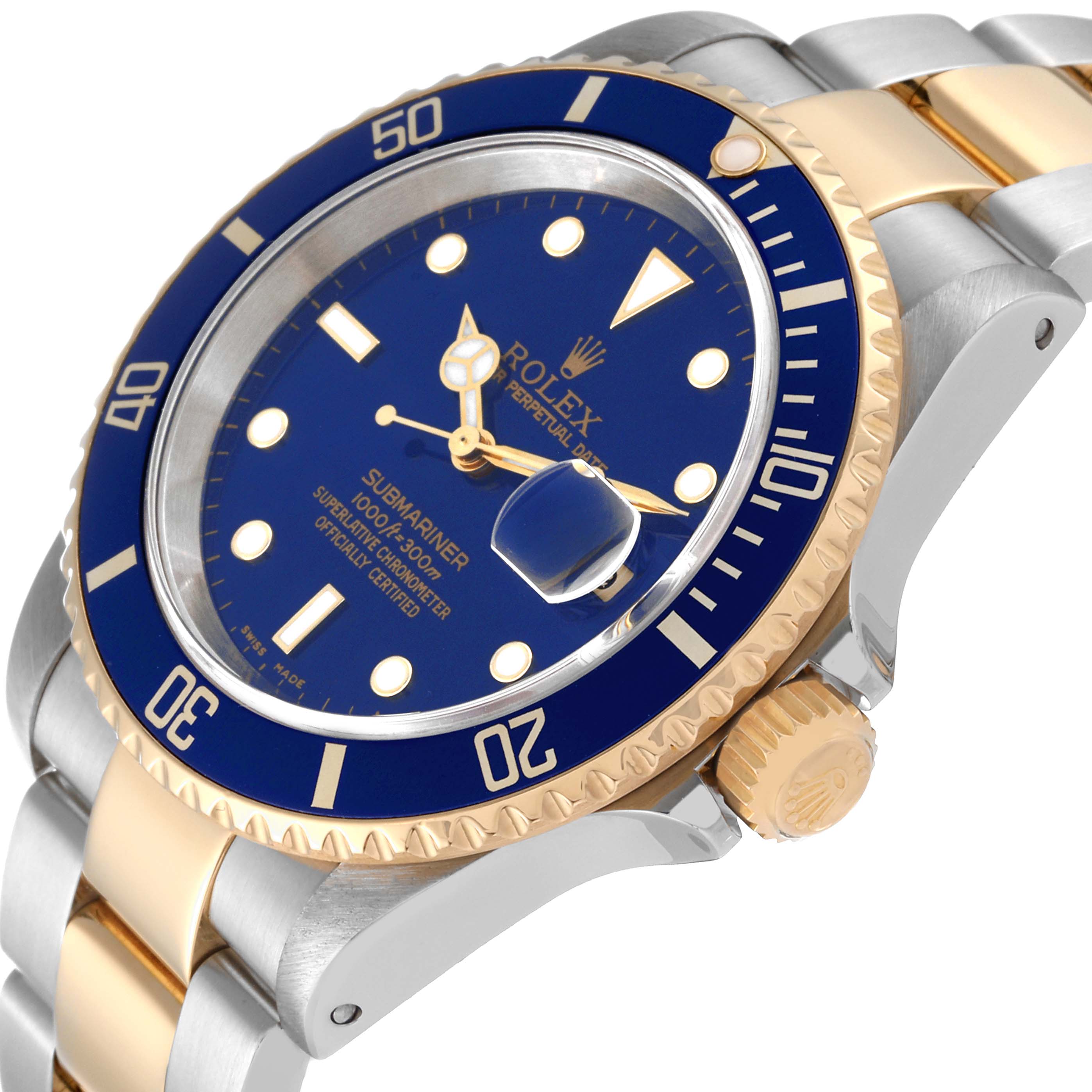 The image shows a close-up, angled view of a Rolex Submariner 16613 Men's Steel and Gold (two tone) Blue Dial 16613 Men's Steel and Gold (two tone) Blue Dial watch highlighting the bezel, crown, dial, and part of the bracelet.