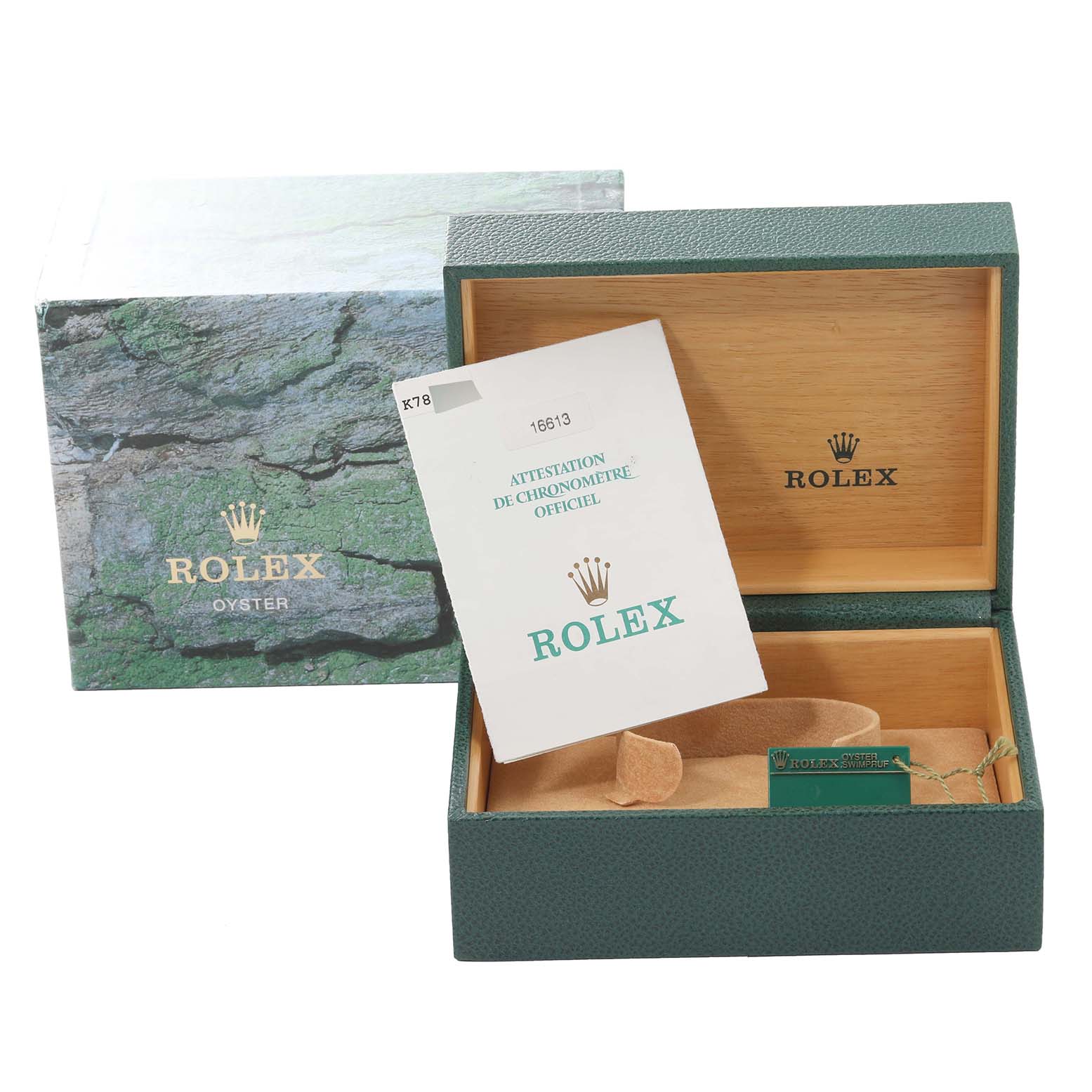 The image shows a Rolex Submariner 16613 Men's Steel and Gold (two tone) Blue Dial 16613 Men's Steel and Gold (two tone) Blue Dial model box, certificate, and watch cushion from an angled top view.