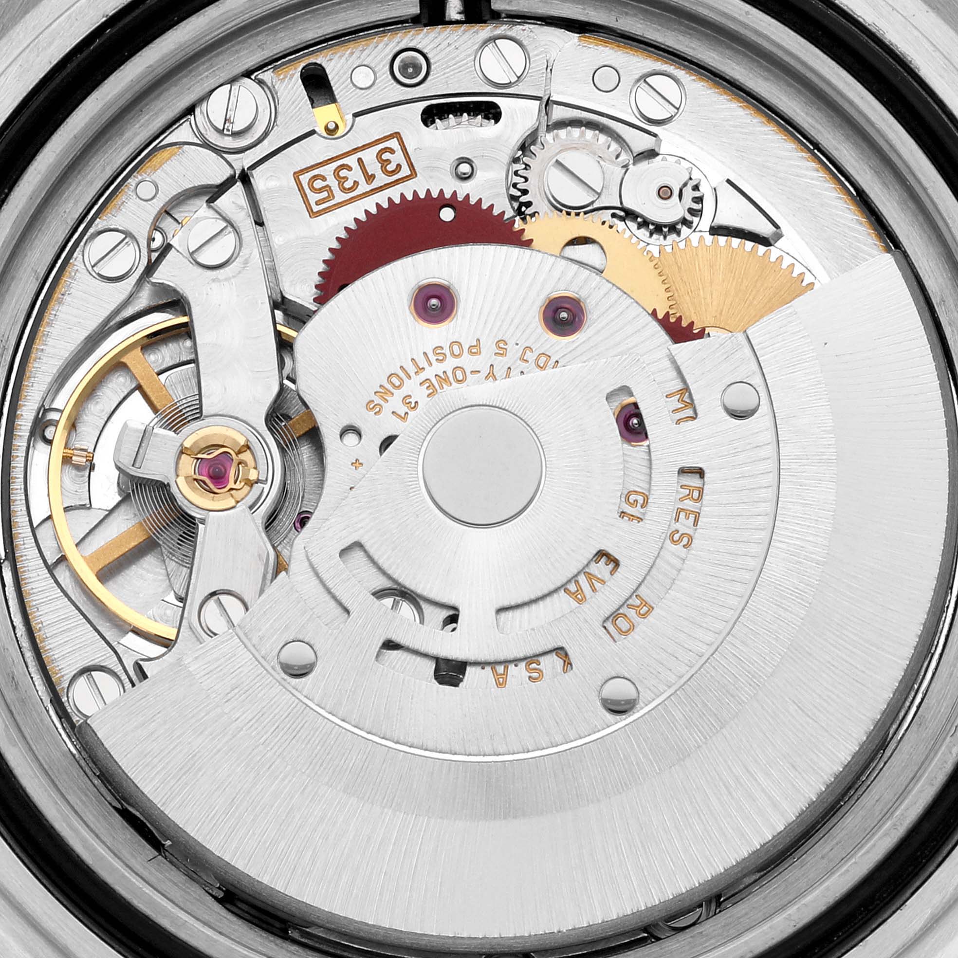 This image shows the internal mechanical components of a Rolex Submariner 16613 Men's Steel and Gold (two tone) Blue Dial 16613 Men's Steel and Gold (two tone) Blue Dial watch movement viewed from a top-down angle.