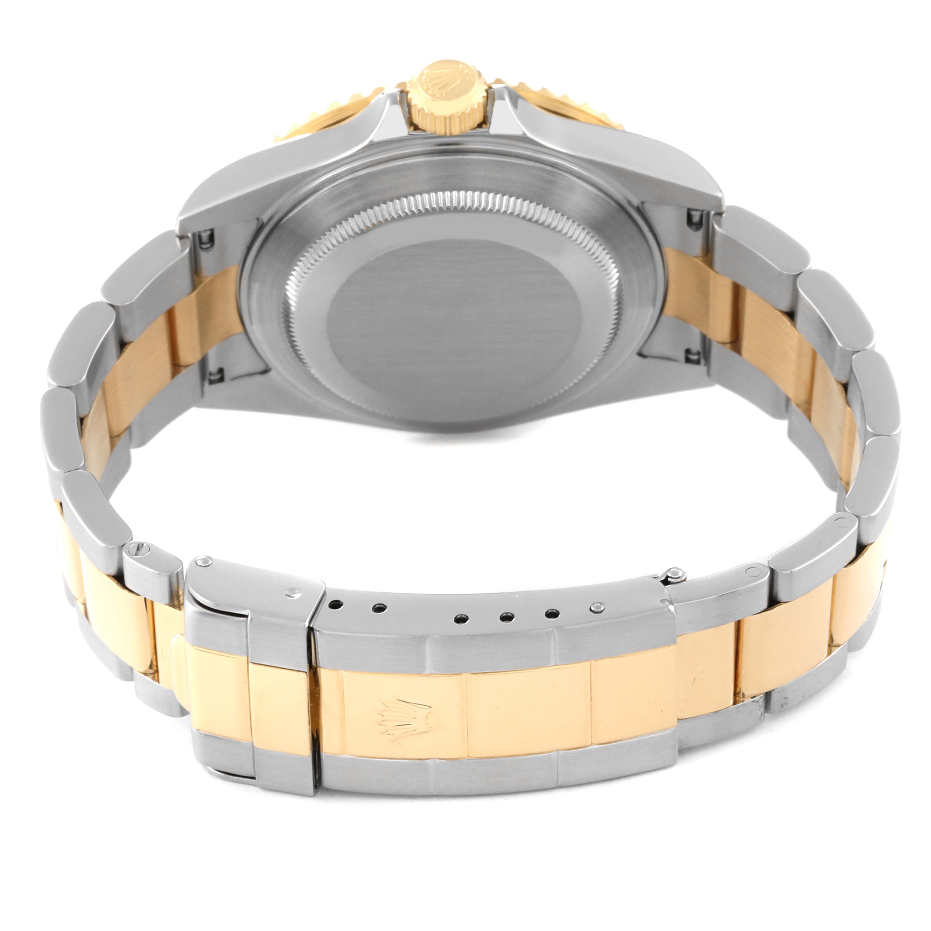 This image shows the back case and two-tone bracelet of a Rolex Submariner 16613T Men
s Steel and Gold (two tone) Blue Dial 16613T Men
s Steel and Gold (two tone) Blue Dial watch.