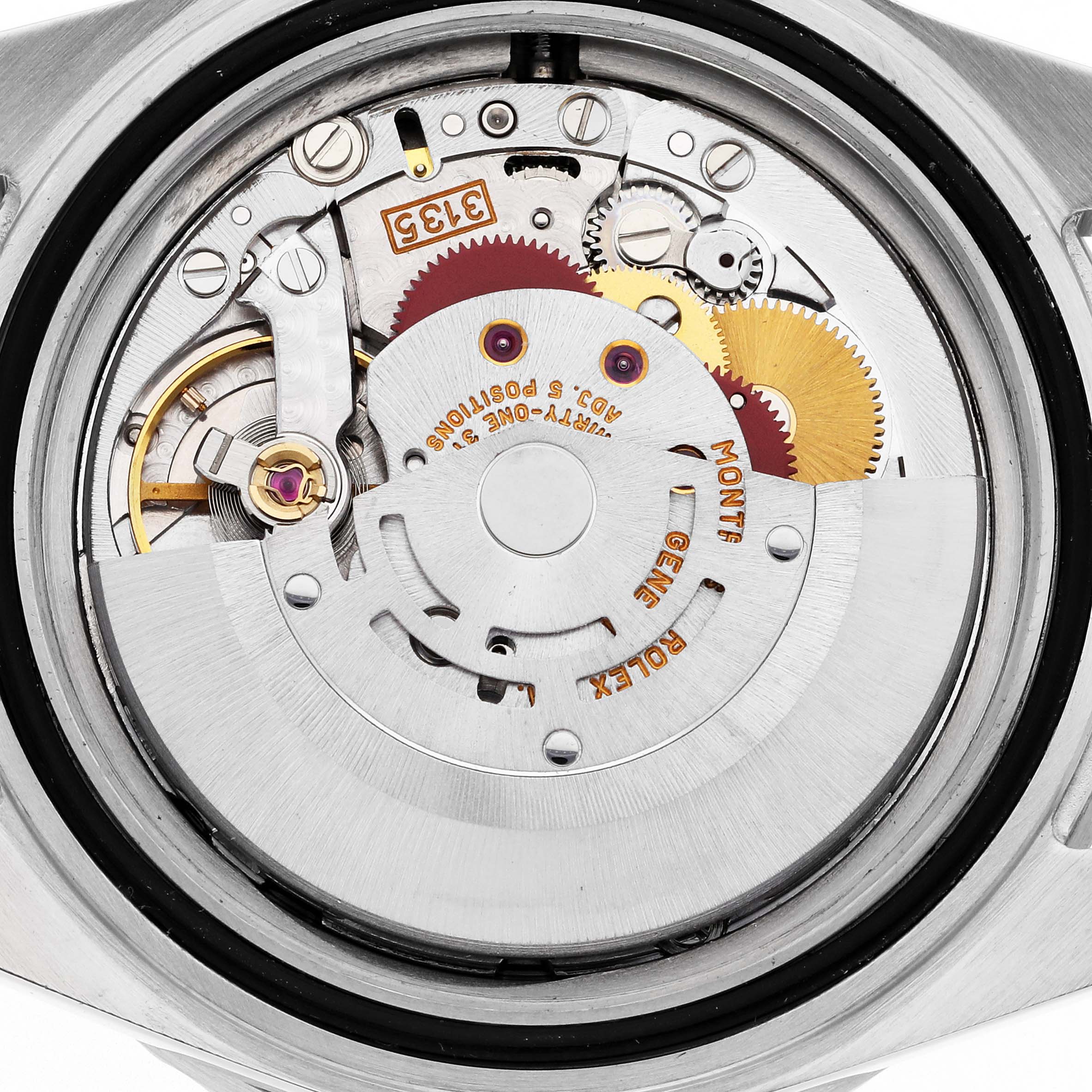 The image shows a close-up of the movement inside a Rolex Submariner 16610 Men's Stainless Steel Black Dial 16610 Men's Stainless Steel Black Dial, highlighting gears and components from a top-down angle.