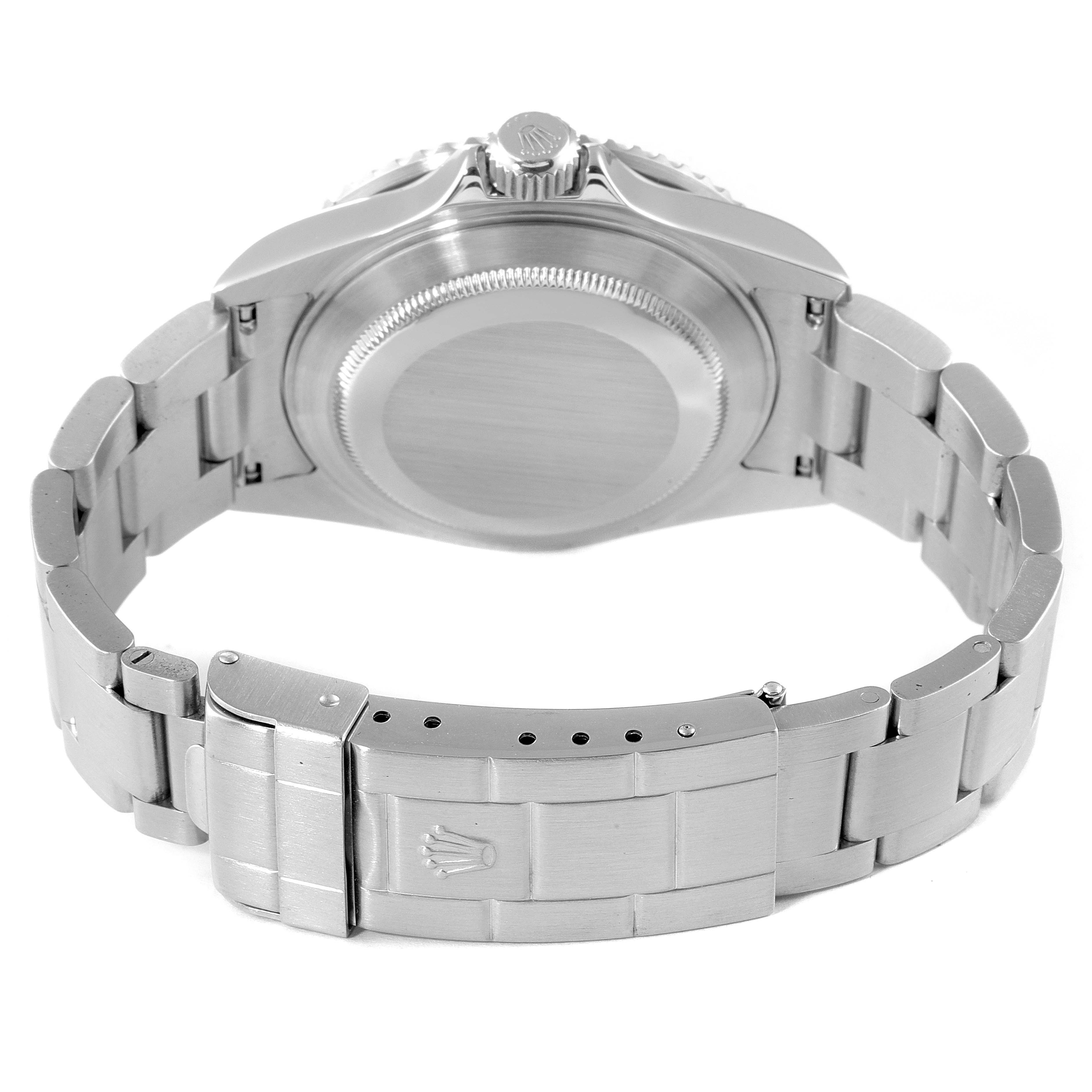 The image shows the back case and bracelet of a Rolex Submariner 16610LV Men
s Stainless Steel Black Dial 16610LV Men
s Stainless Steel Black Dial watch, viewed from a rear angle.