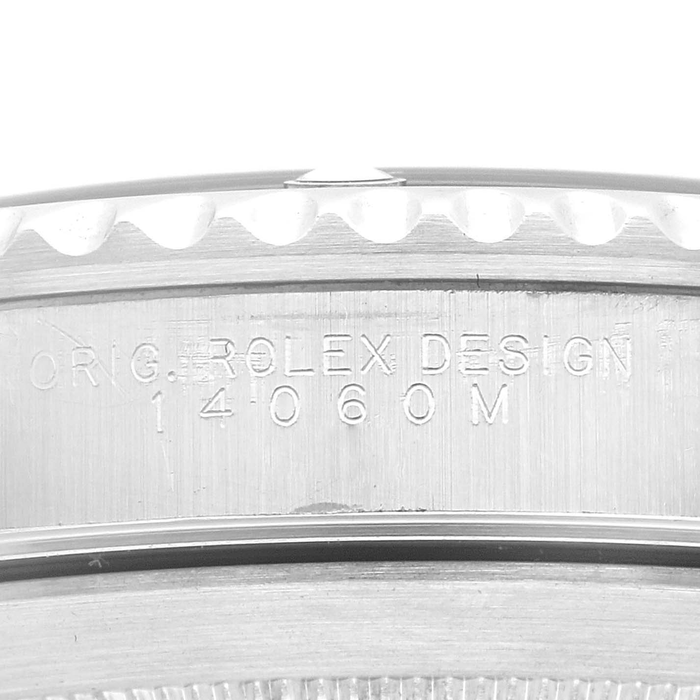 The image shows a close-up angle of the side of a Rolex Submariner 14060 Men
s Stainless Steel Black Dial 14060 Men
s Stainless Steel Black Dial, highlighting the engraved model number and design details.