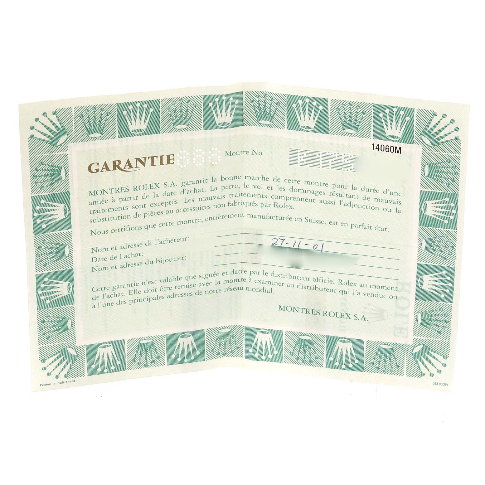 This image shows the warranty certificate for a Rolex Submariner 14060 Men
s Stainless Steel Black Dial 14060 Men
s Stainless Steel Black Dial watch, displayed fully open with text in French.