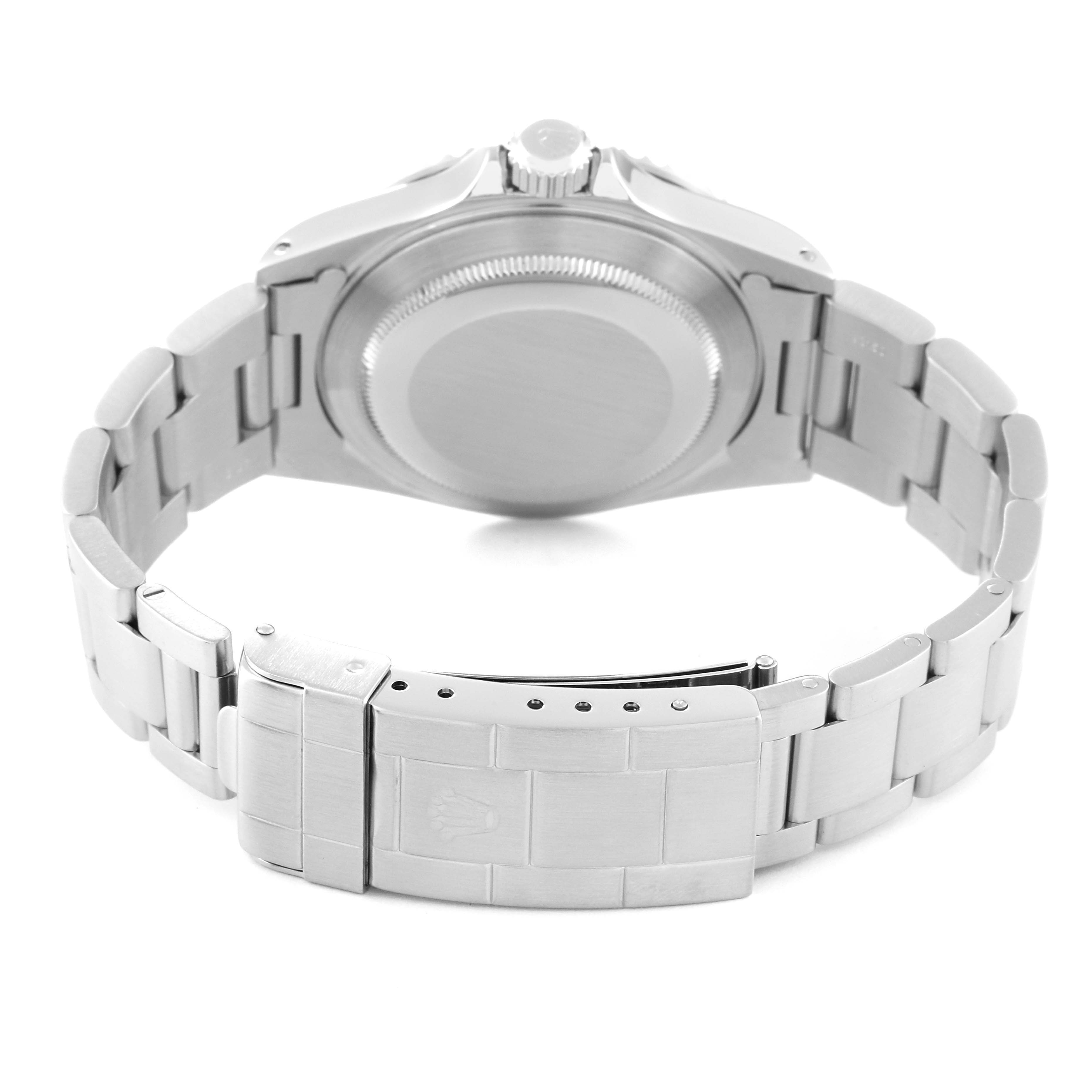 The image shows the back case and the bracelet with the clasp of a Rolex Submariner 14060 Men
s Stainless Steel Black Dial 14060 Men
s Stainless Steel Black Dial watch.