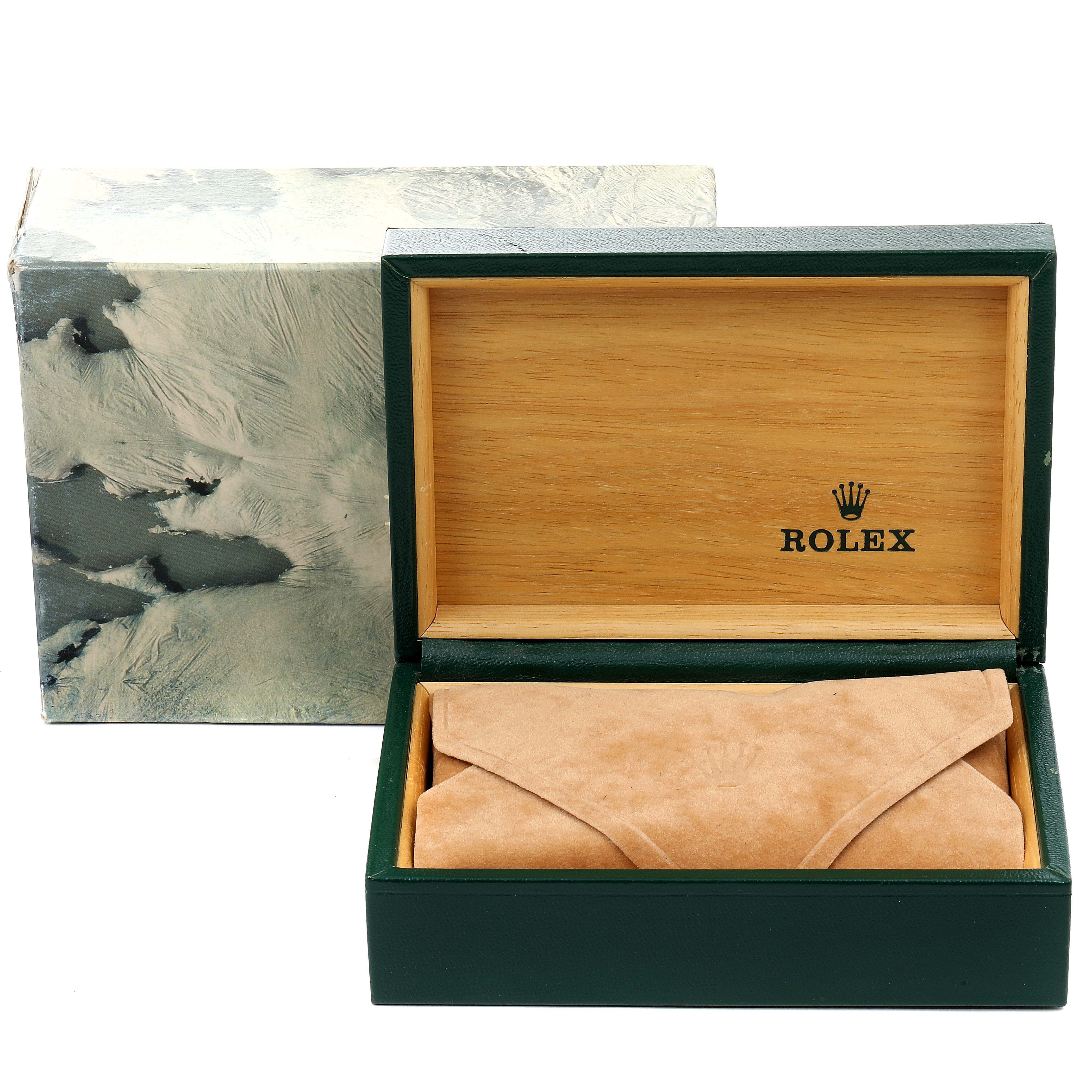 The image shows a Rolex Submariner 16613 Men
s Steel and Gold (two tone) Blue Dial 16613 Men
s Steel and Gold (two tone) Blue Dial watch box and pouch, featuring an open green wooden box with the Rolex logo inside.