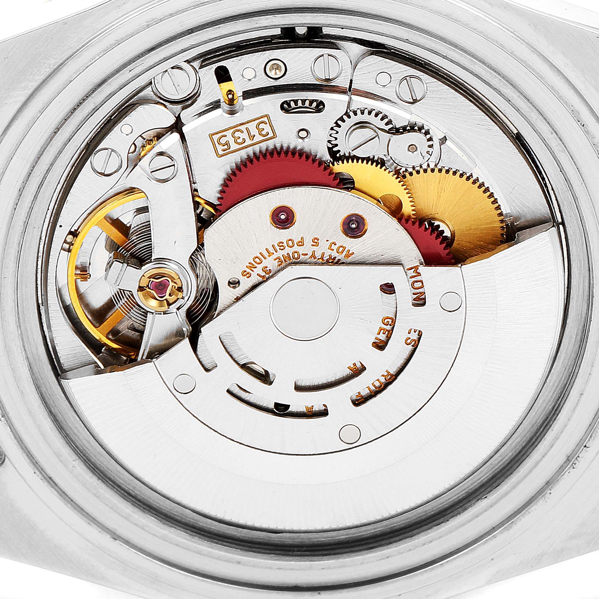 This image shows the internal mechanics and movement parts of a Rolex Submariner 16613 Men
s Steel and Gold (two tone) Blue Dial 16613 Men
s Steel and Gold (two tone) Blue Dial watch.