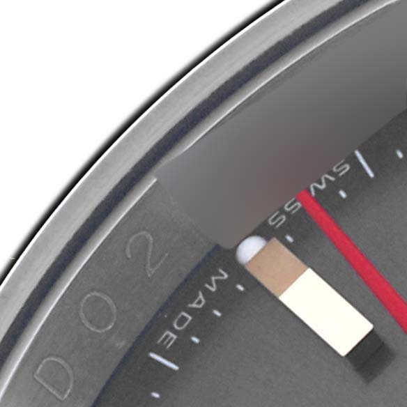 The image shows a close-up of the Rolex Turn-o-Graph 116263 Men
s Steel and Gold (two tone) Grey Dial 116263 Men
s Steel and Gold (two tone) Grey Dial watch dial and bezel, focusing on the markers and part of the hand.