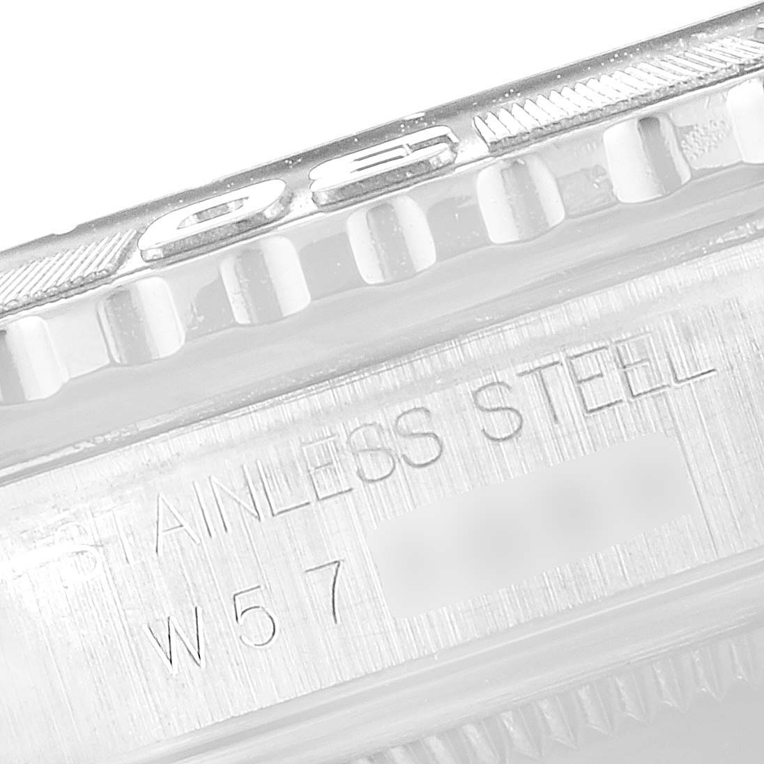 This image shows a close-up angle of the case with part of the bezel and engraved "STAINLESS STEEL" on a Rolex Turn-o-Graph 16264 Men
s Stainless Steel White Dial 16264 Men
s Stainless Steel White Dial watch.