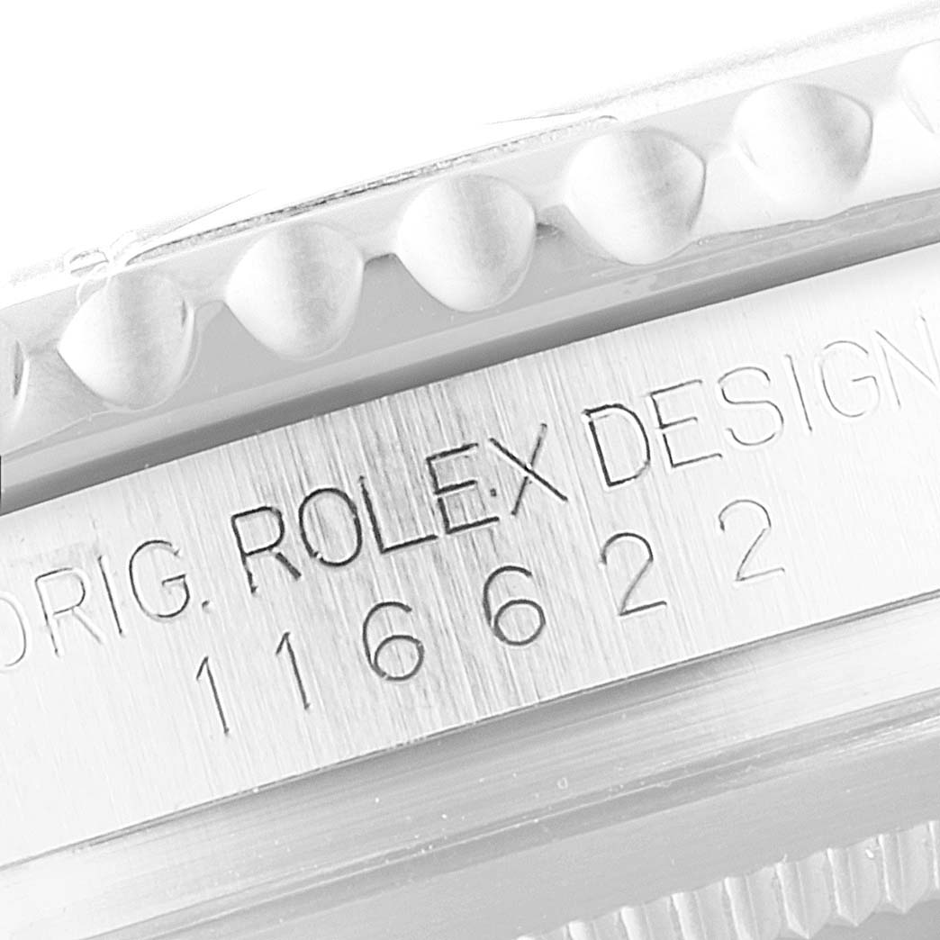 This image shows a close-up of the engraved "Rolex Design" and serial number on a Rolex Yacht-Master 116622 Men
s Stainless Steel Blue Dial 116622 Men
s Stainless Steel Blue Dial model
s side.