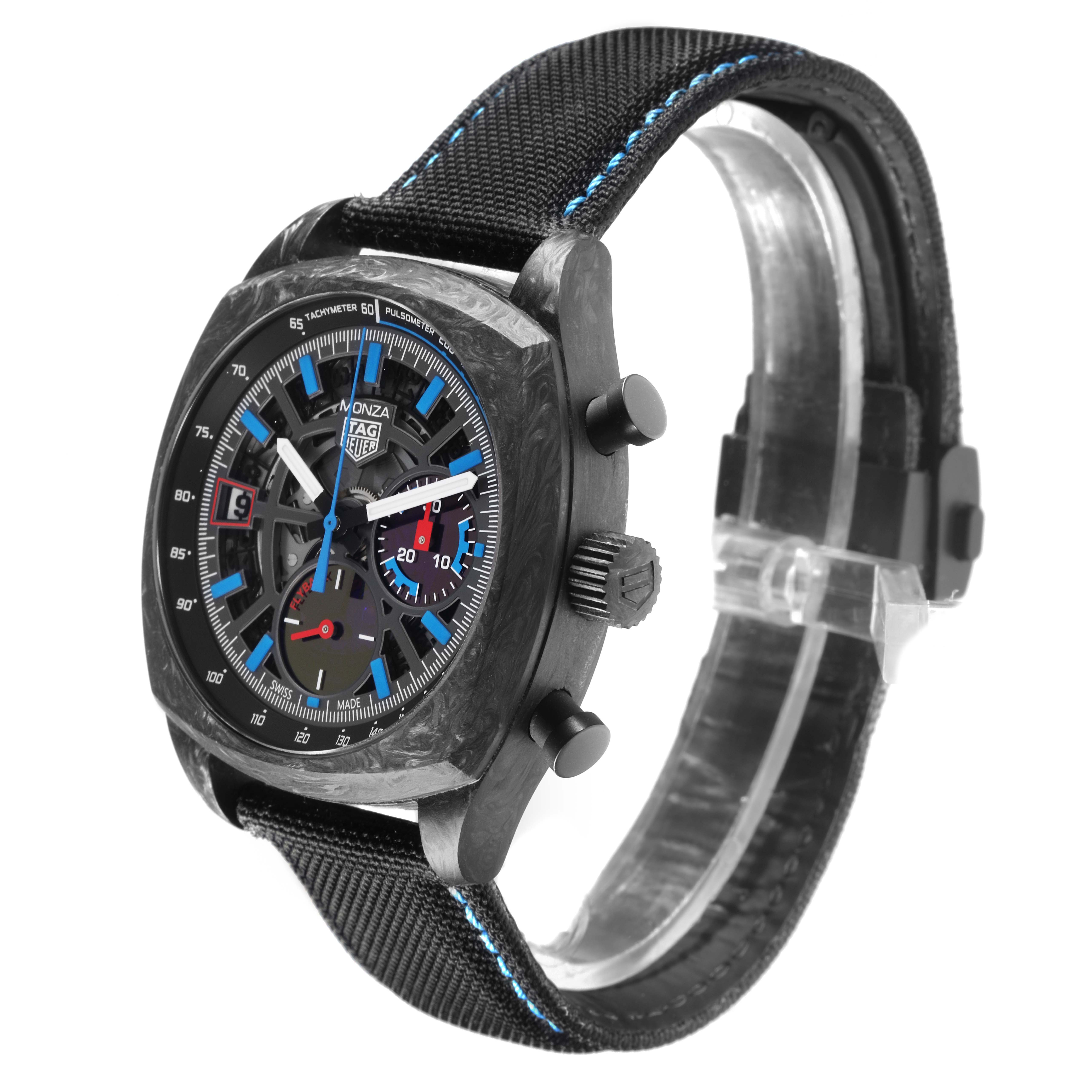 The Tag Heuer Monza CR5090.FN6001 Men's Ceramic Transparent Dial CR5090.FN6001 Men's Ceramic Transparent Dial watch is shown at a three-quarter angle, highlighting its face, crown, pushers, and strap with blue stitching.