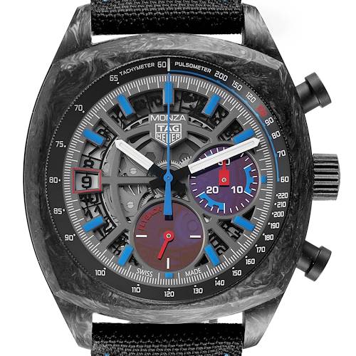 The Tag Heuer Monza watch is shown from the front, displaying its detailed dial, bezel, pushers, and crown.