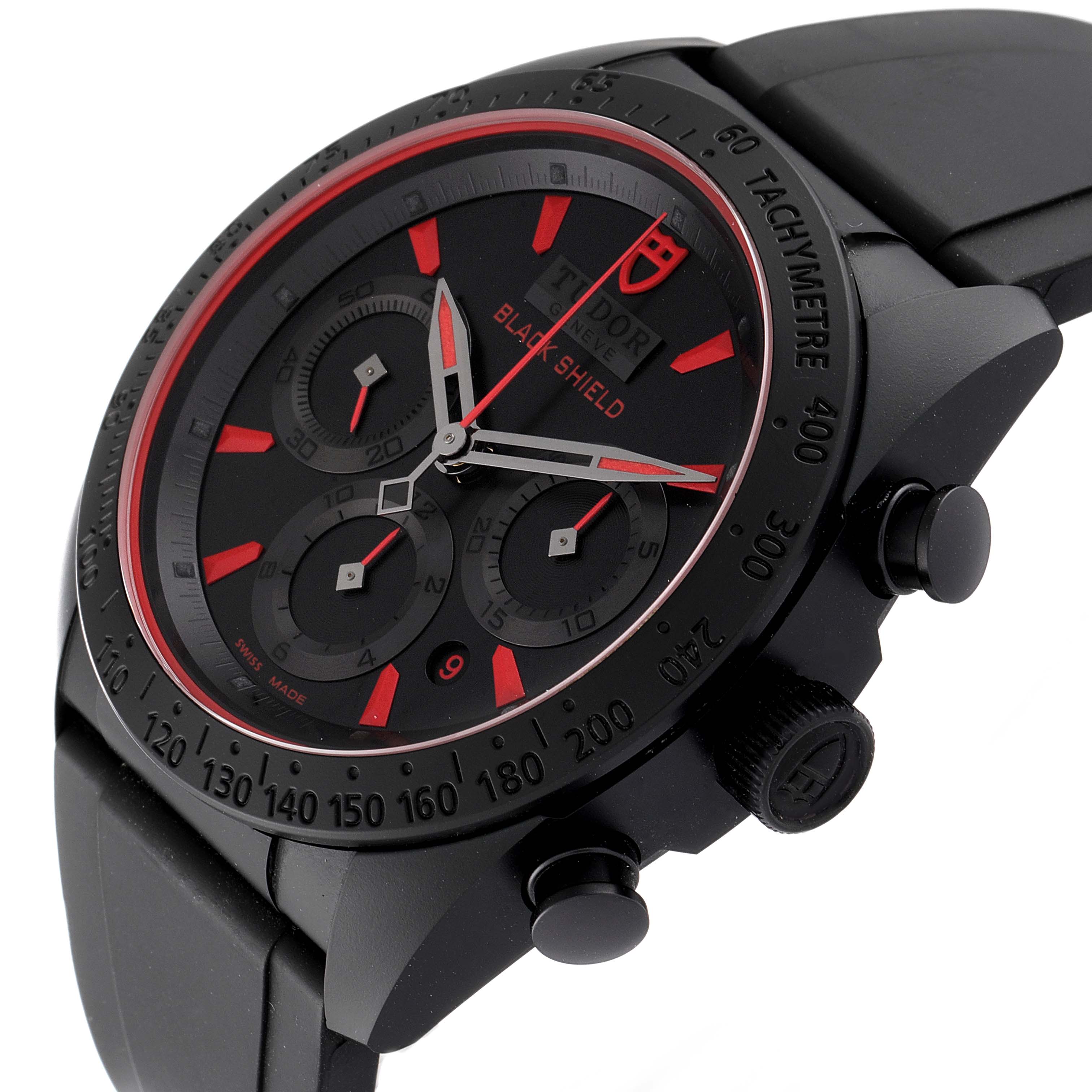 The image shows a close-up of the Tudor Fastrider 42000CR Men's Ceramic Black Dial 42000CR Men's Ceramic Black Dial Black Shield model watch, highlighting its dial, tachymeter bezel, and pushers.