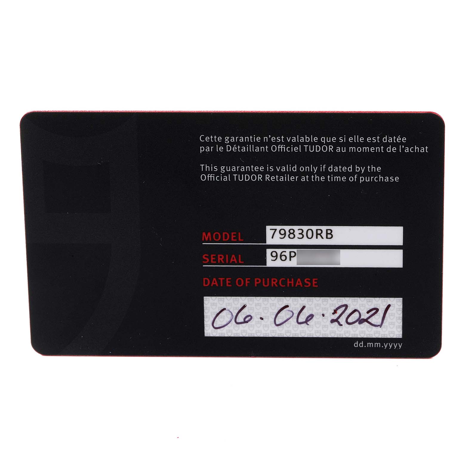 This image shows the warranty card for the Tudor Heritage Black Bay 79830RB Men's Stainless Steel Black Dial 79830RB Men's Stainless Steel Black Dial model 79830RB, including the serial number and date of purchase.