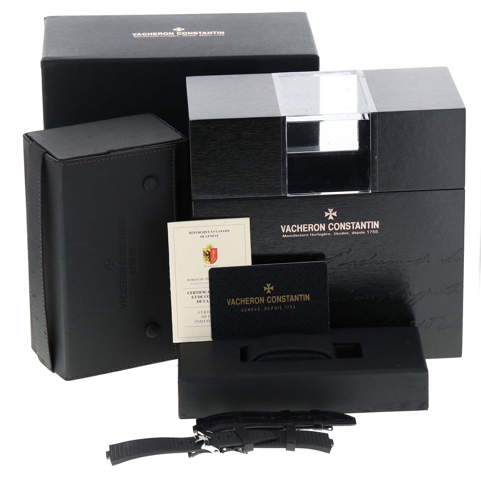 The image shows the packaging, warranty cards, and user manuals for the Vacheron Constantin Overseas 7900V/110A-B333 Men's Stainless Steel Silver Dial 7900V/110A-B333 Men's Stainless Steel Silver Dial watch, displayed from a front angle.