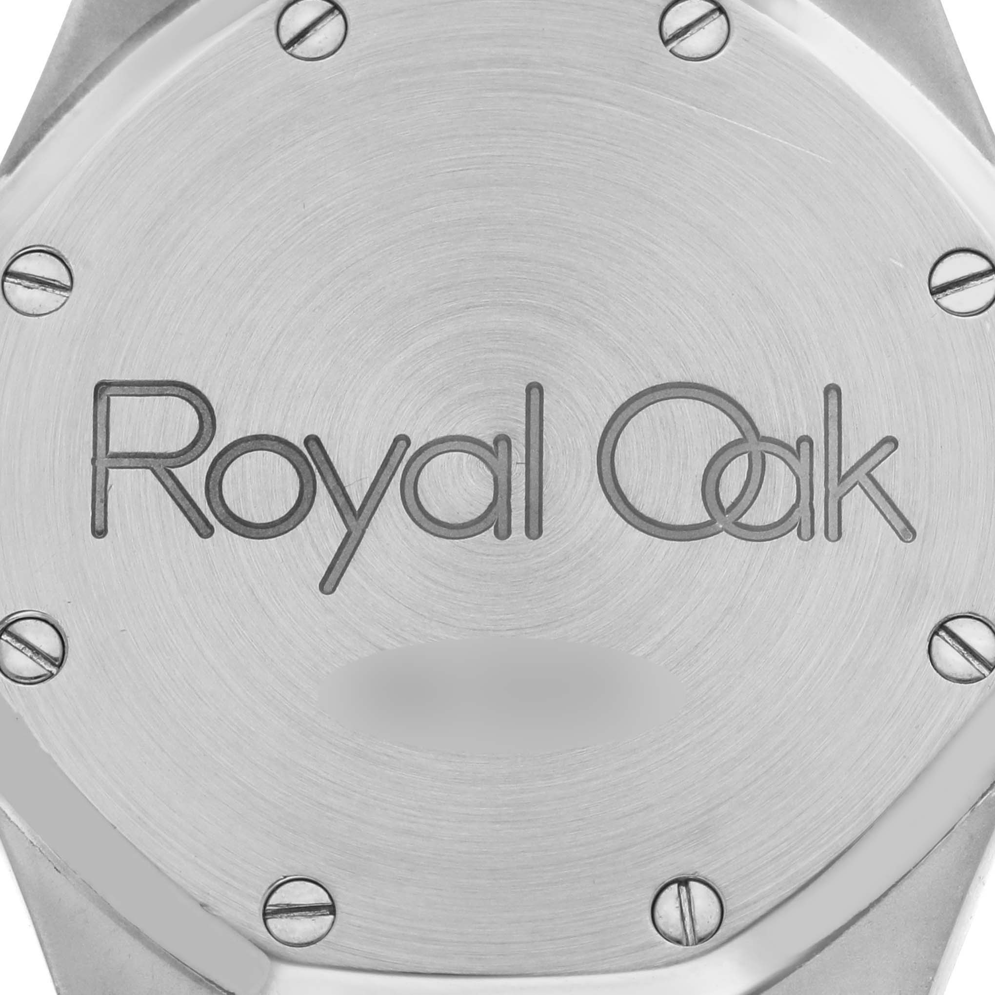 The image shows the back of the Audemars Piguet Royal Oak 25594SA Men's Steel and Gold (two tone) Silver Dial 25594SA Men's Steel and Gold (two tone) Silver Dial watch featuring the engraved logo and visible screws.