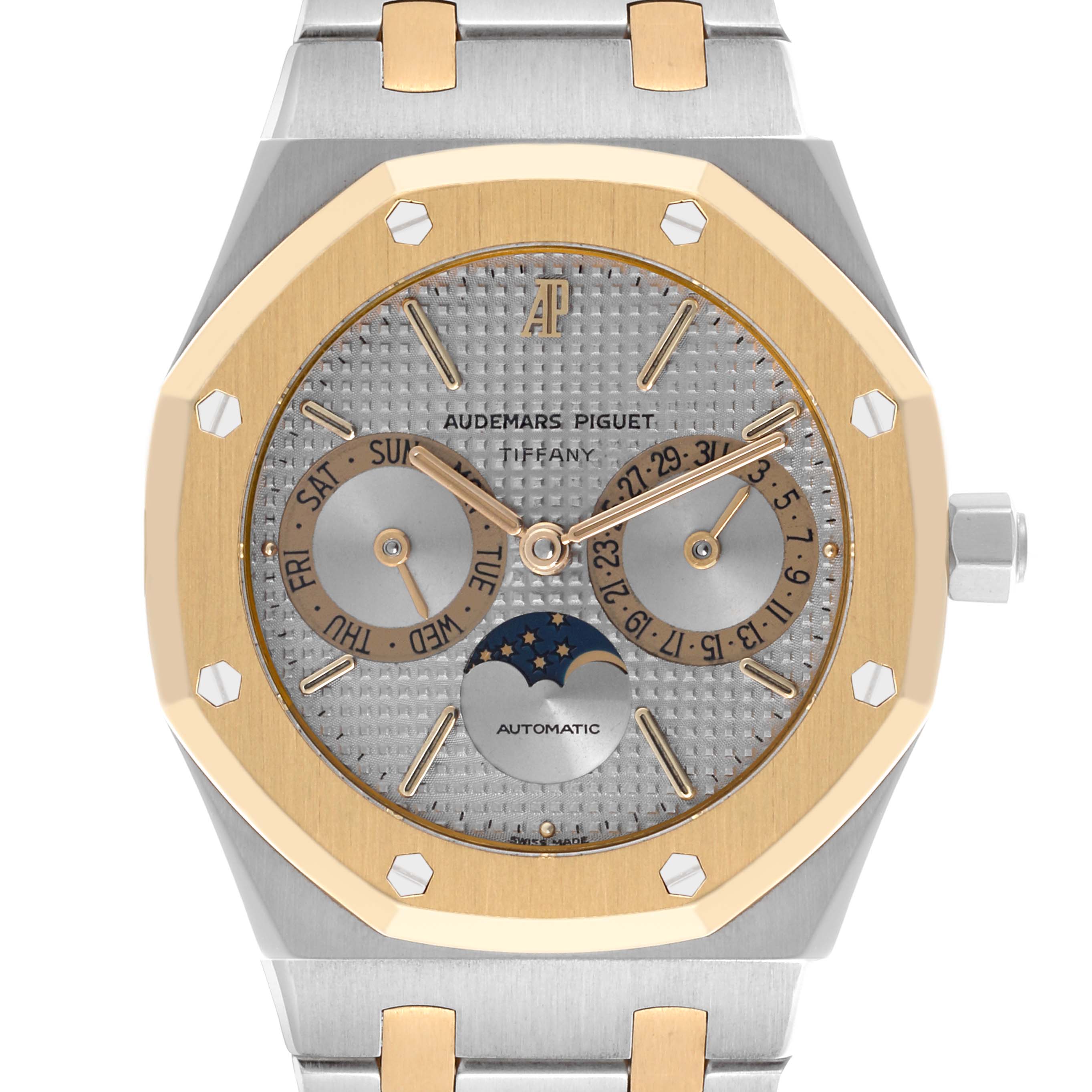 The image shows a front view of an Audemars Piguet Royal Oak 25594SA Men's Steel and Gold (two tone) Silver Dial 25594SA Men's Steel and Gold (two tone) Silver Dial with gold bezel, day, date, and moon phase indicators on the dial.