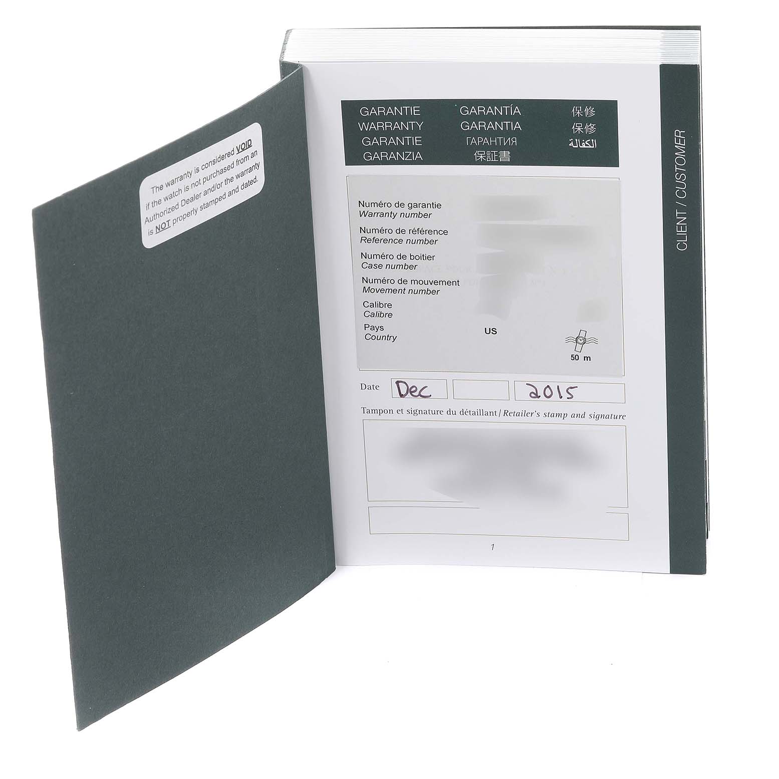 The image shows an opened warranty booklet for a Royal Oak model by Audemars Piguet, displaying warranty information and dealer stamp.