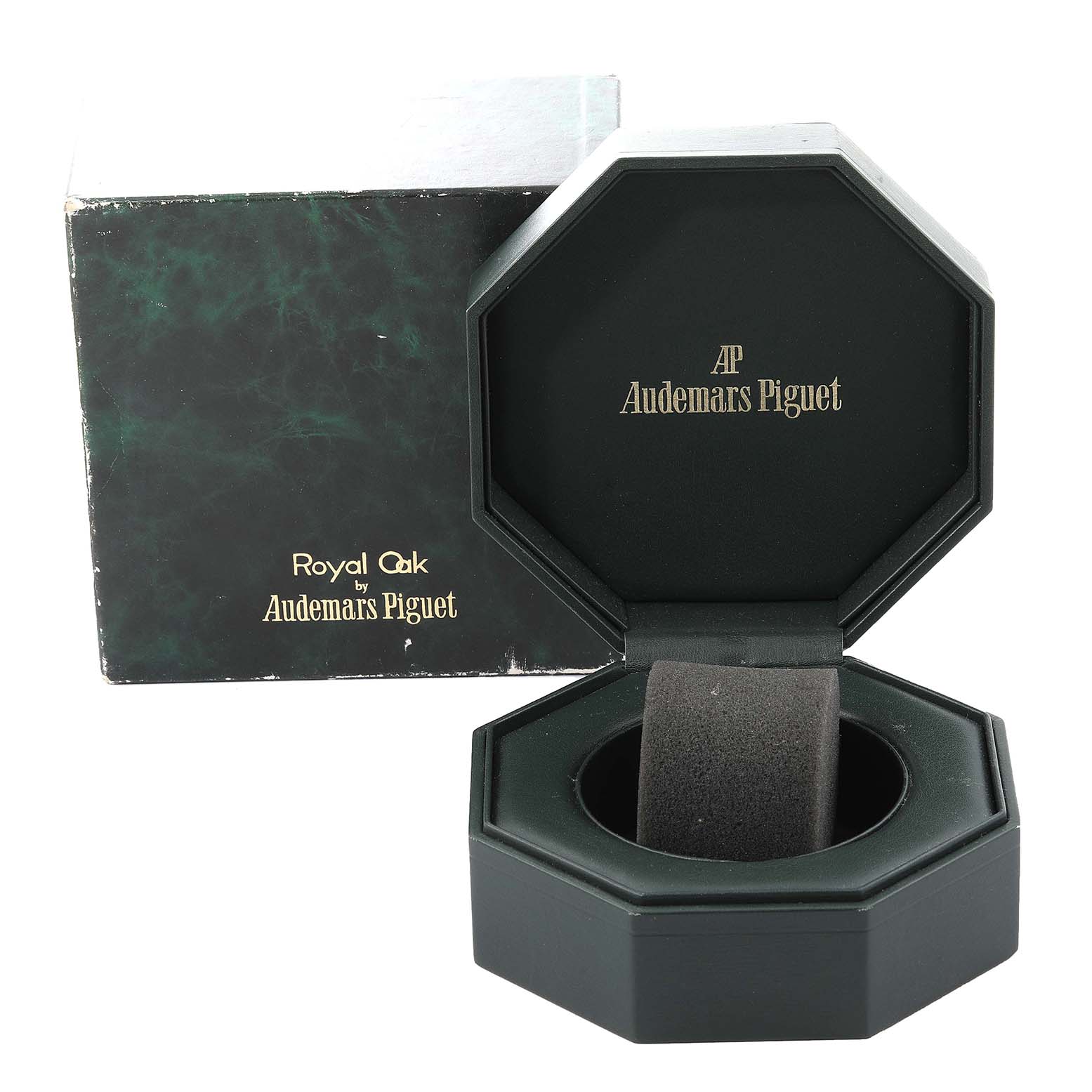 The image shows an open presentation box for the Royal Oak model by Audemars Piguet, displaying the interior cushion and branding.
