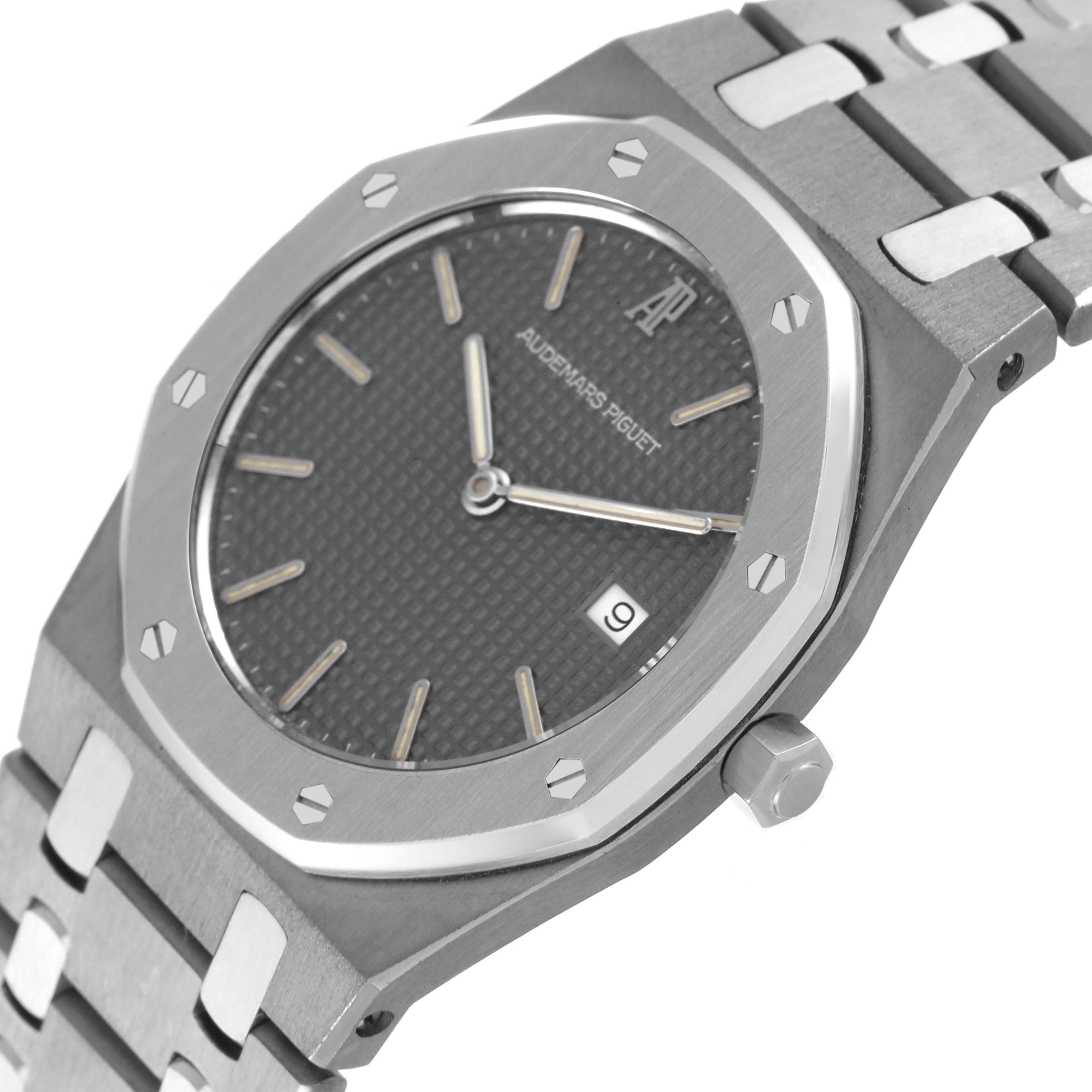 The image shows a close-up view of the dial and stainless steel bracelet of the Audemars Piguet Royal Oak 56175TT Men's Stainless Steel Grey Dial 56175TT Men's Stainless Steel Grey Dial watch.