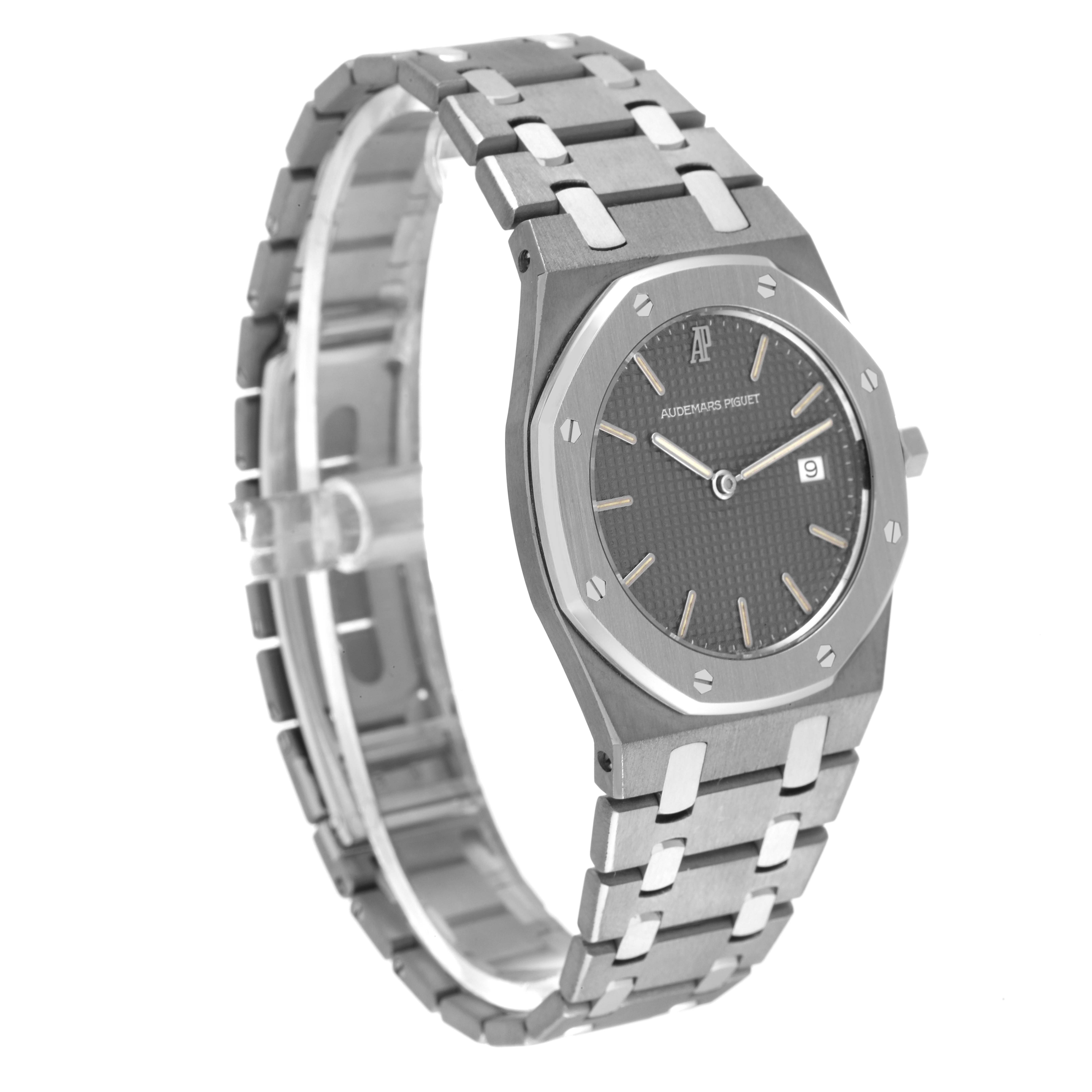 This image shows a side and angled view of an Audemars Piguet Royal Oak 56175TT Men's Stainless Steel Grey Dial 56175TT Men's Stainless Steel Grey Dial watch, focusing on the case, bezel, bracelet, and dial.