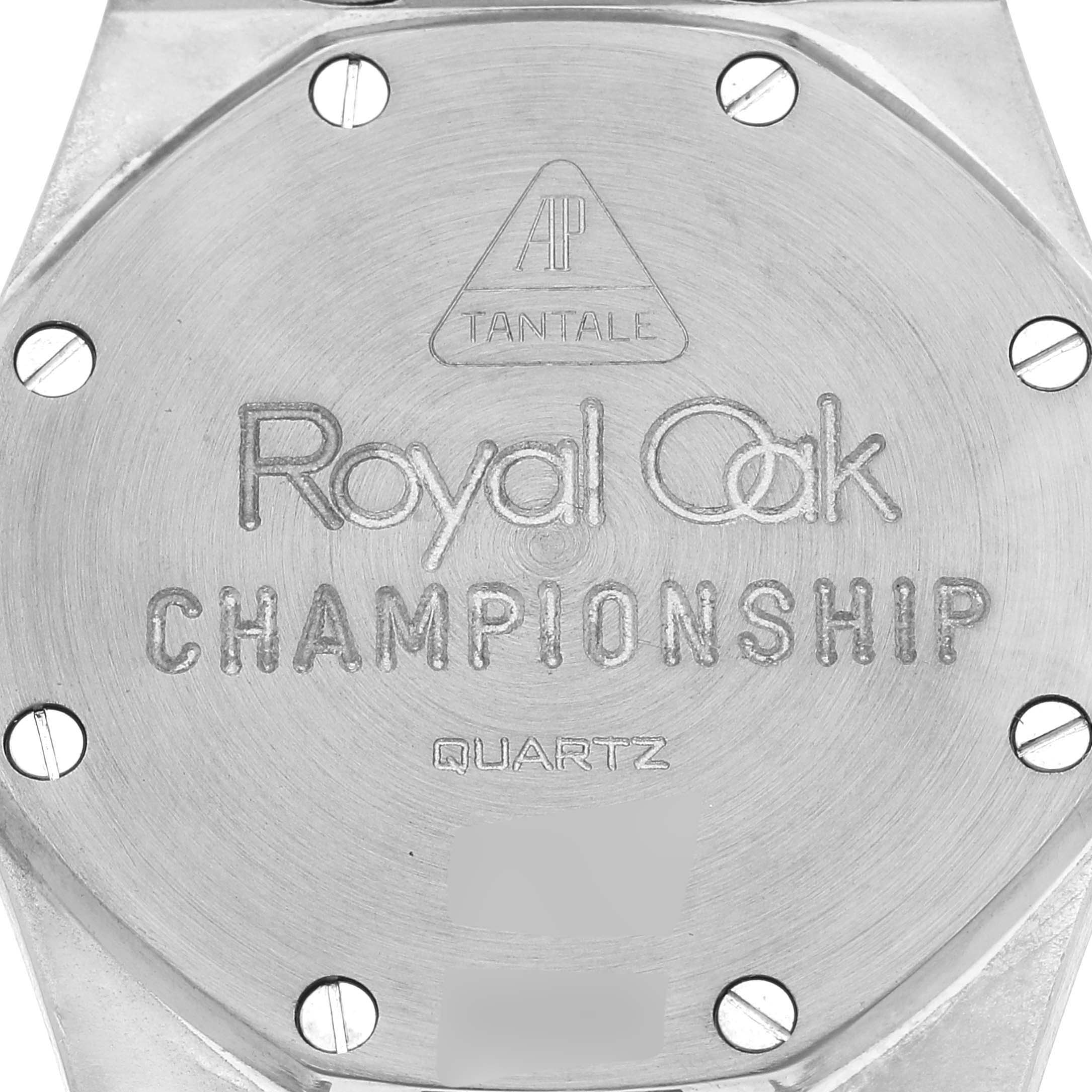 This is the back view of an Audemars Piguet Royal Oak 56175TT Men's Stainless Steel Grey Dial 56175TT Men's Stainless Steel Grey Dial Championship Quartz watch, showing screws and engravings.