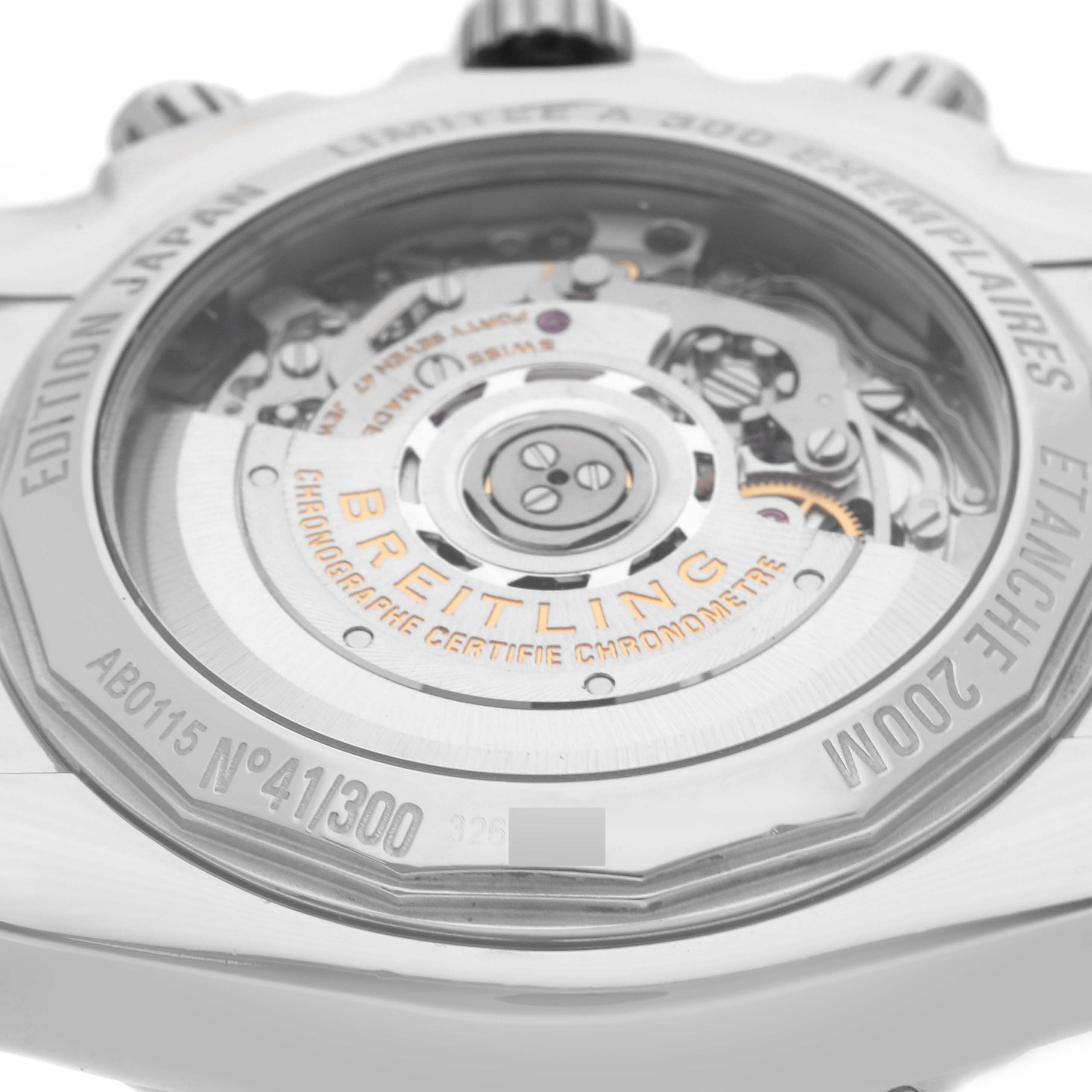 The image shows the back of a Breitling Chronomat AB0115 Men's Stainless Steel Mother of Pearl Dial AB0115 Men's Stainless Steel Mother of Pearl Dial watch, highlighting its movement and inscriptions.