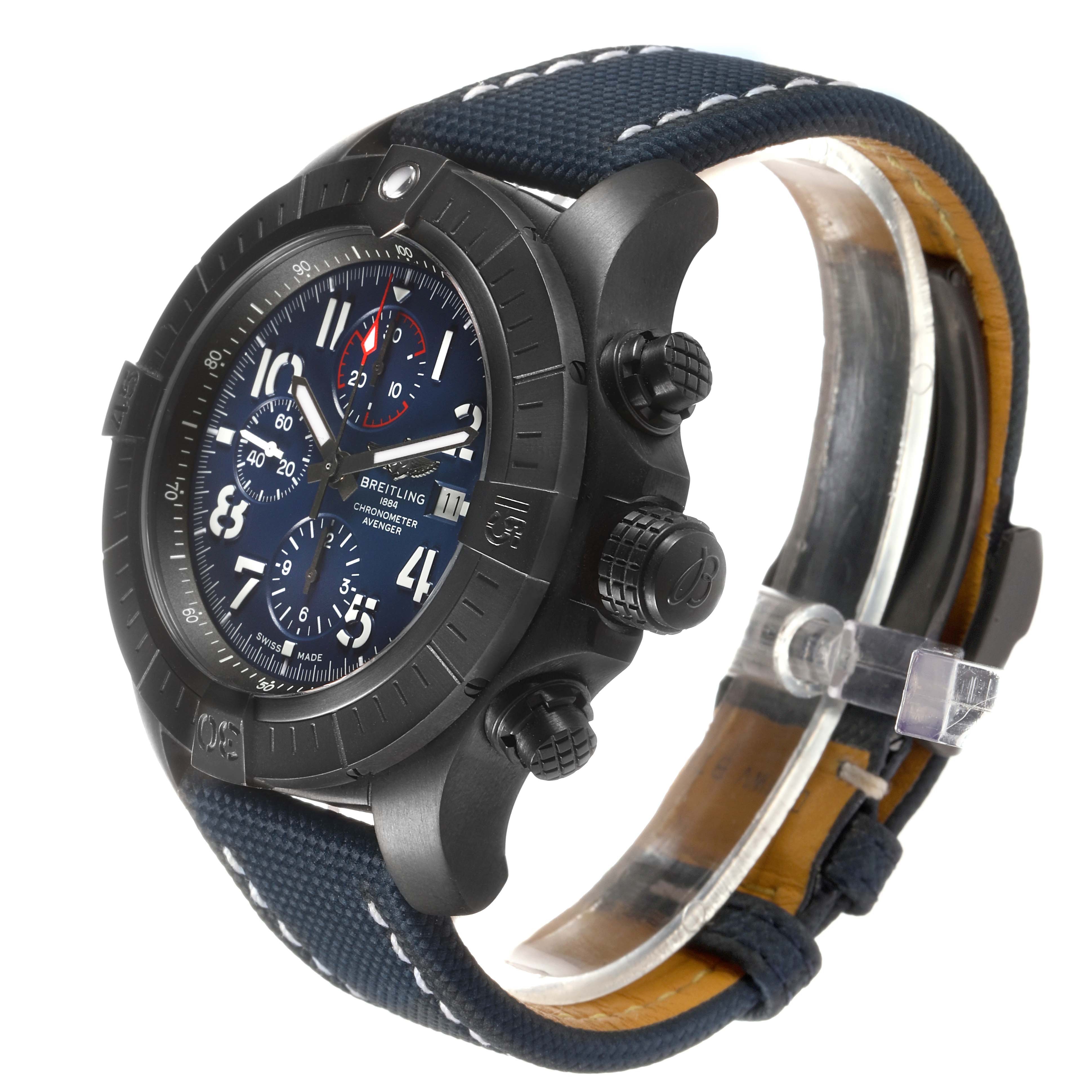 The image shows a side and front angle of the Breitling Avenger V13375101C1X1 Men's Titanium Blue Dial, highlighting its bezel, dial, and textured strap.