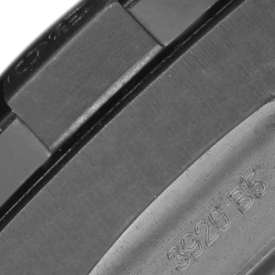 The image shows a close-up of the Breitling Avenger V13375101C1X1 Men's Titanium Blue Dial's serial markings on its metal strap or clasp.