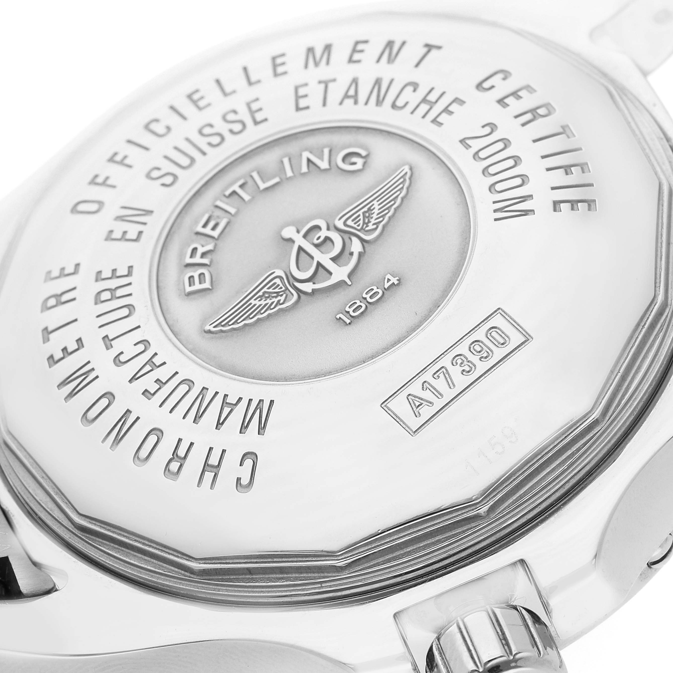 This image shows the case back and crown of a Breitling Superocean A17390 Men's Stainless Steel Black Dial A17390 Men's Stainless Steel Black Dial watch from a close-up angle.