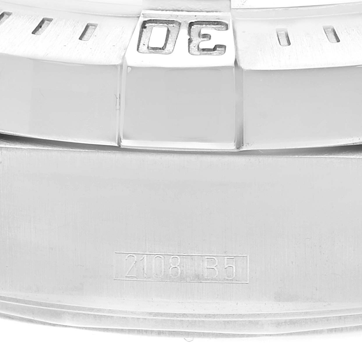 This close-up of the Breitling Superocean A17390 Men's Stainless Steel Black Dial A17390 Men's Stainless Steel Black Dial watch shows part of the bezel with the number "30" and engraved markings below.