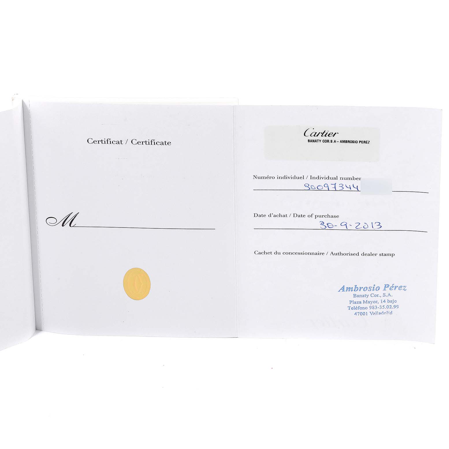 This image shows an open warranty certificate for the Ballon Bleu model by Cartier, with purchase details filled in.