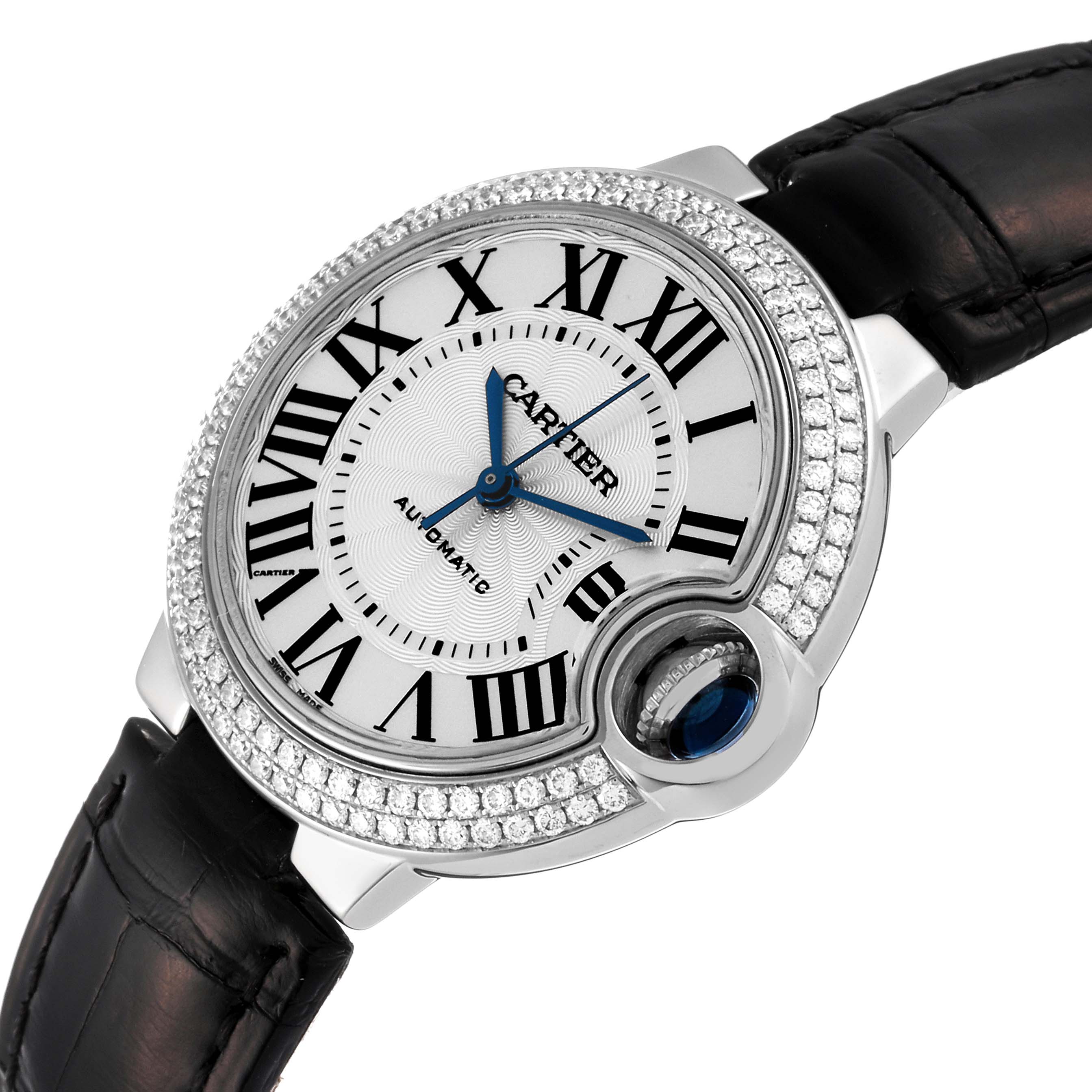 This image shows a Cartier Ballon Bleu WE902067 Women
s White Gold Silver Dial WE902067 Women
s White Gold Silver Dial watch at a slight angle, highlighting its face, bezel, blue hands, and black leather strap.