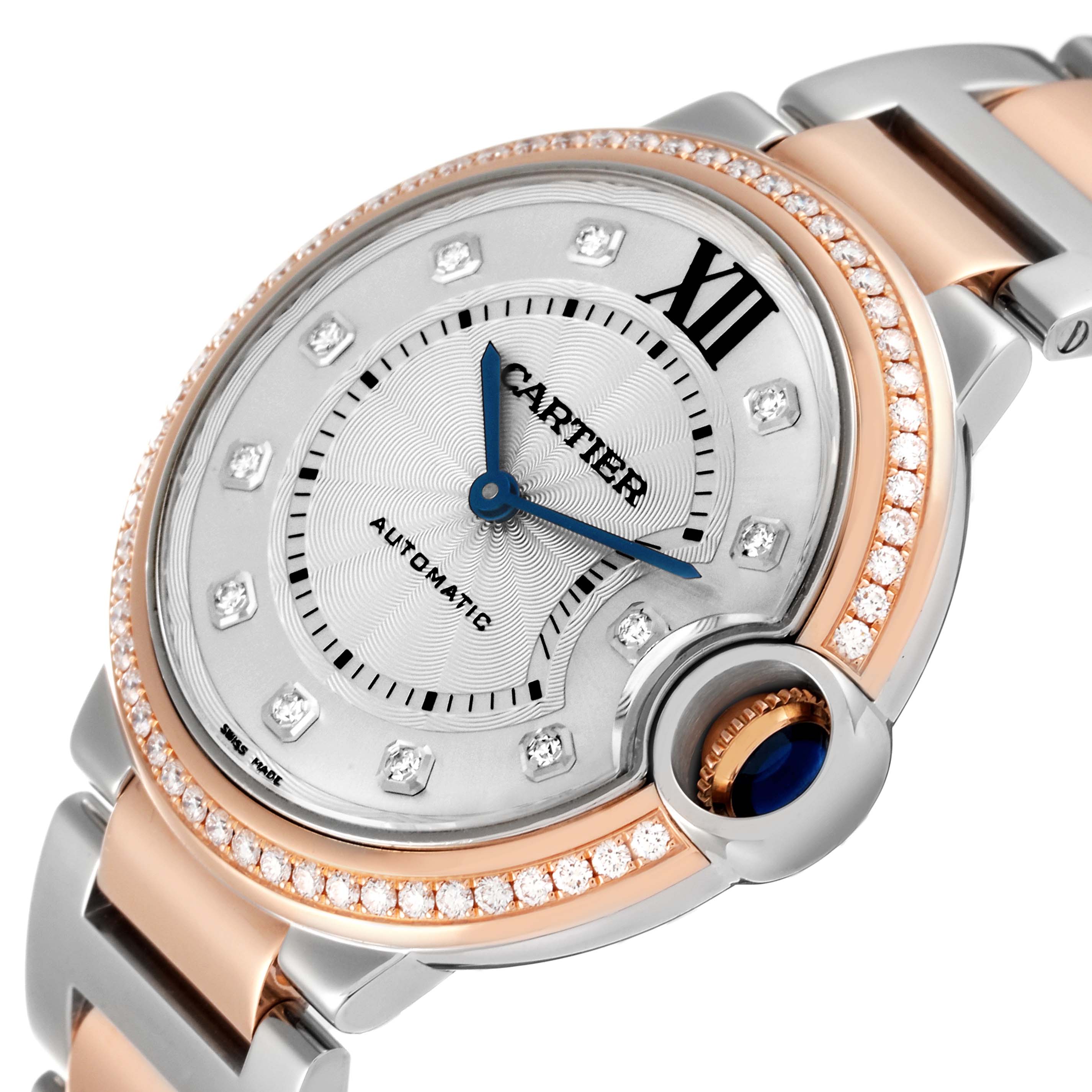 This image shows the face and part of the band of a Cartier Ballon Bleu W3BB0004 Women
s Steel and Gold (two tone) Silver Dial W3BB0004 Women
s Steel and Gold (two tone) Silver Dial watch, featuring a two-tone design and diamond accents.