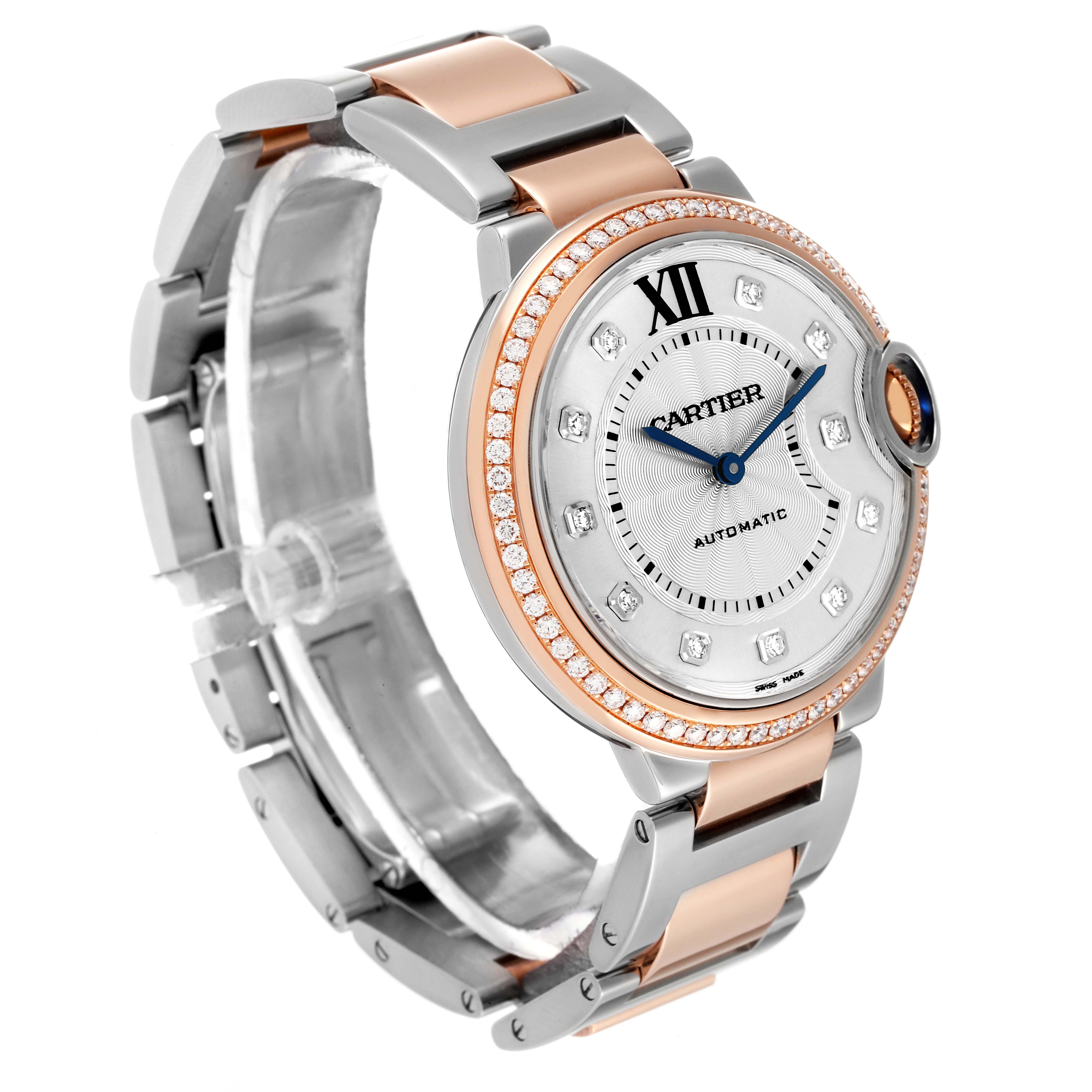 The image shows a side angle of the Cartier Ballon Bleu W3BB0004 Women
s Steel and Gold (two tone) Silver Dial W3BB0004 Women
s Steel and Gold (two tone) Silver Dial watch, displaying its dial, bezel, and two-tone bracelet.