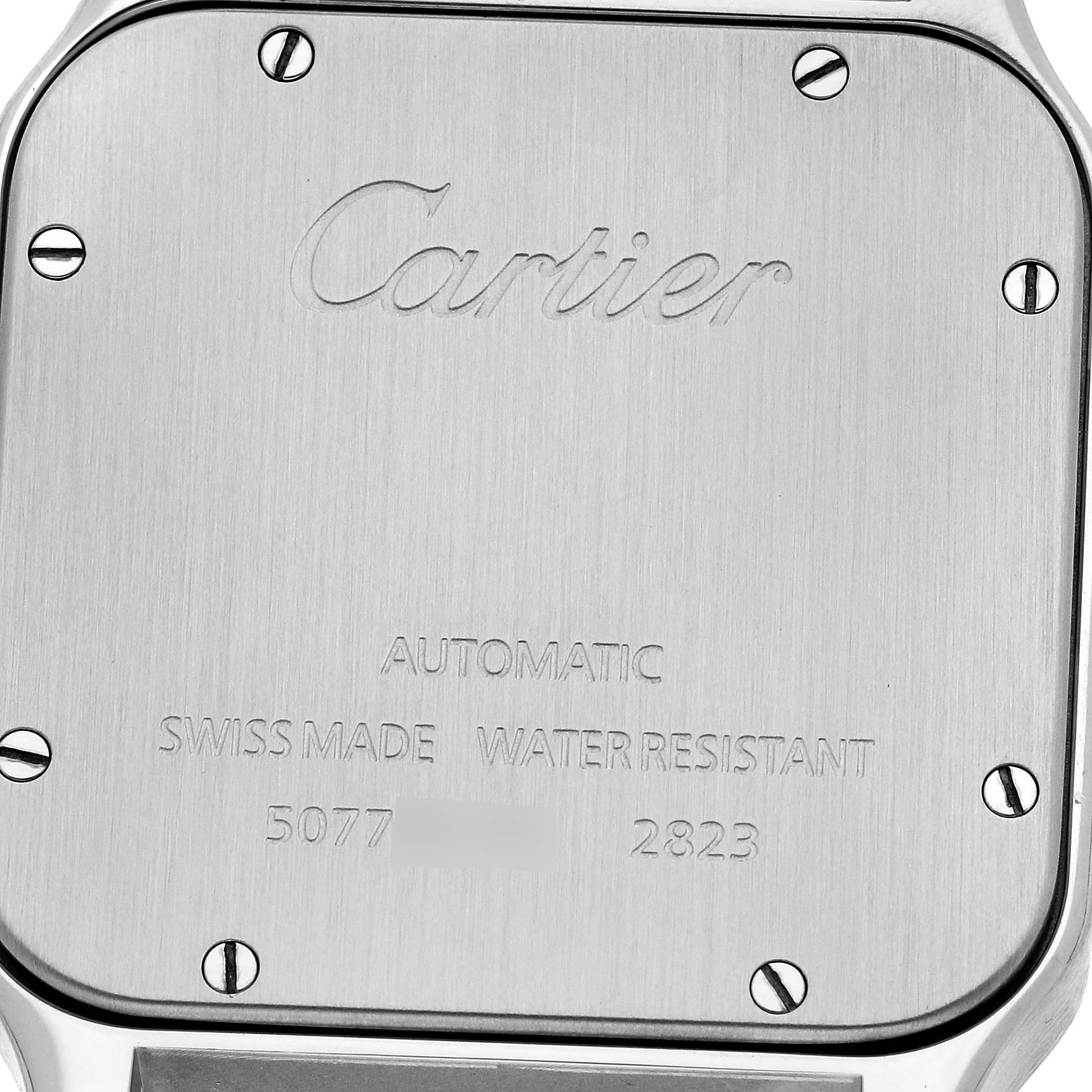 This image shows a close-up of the back case of a Santos model watch by Cartier.