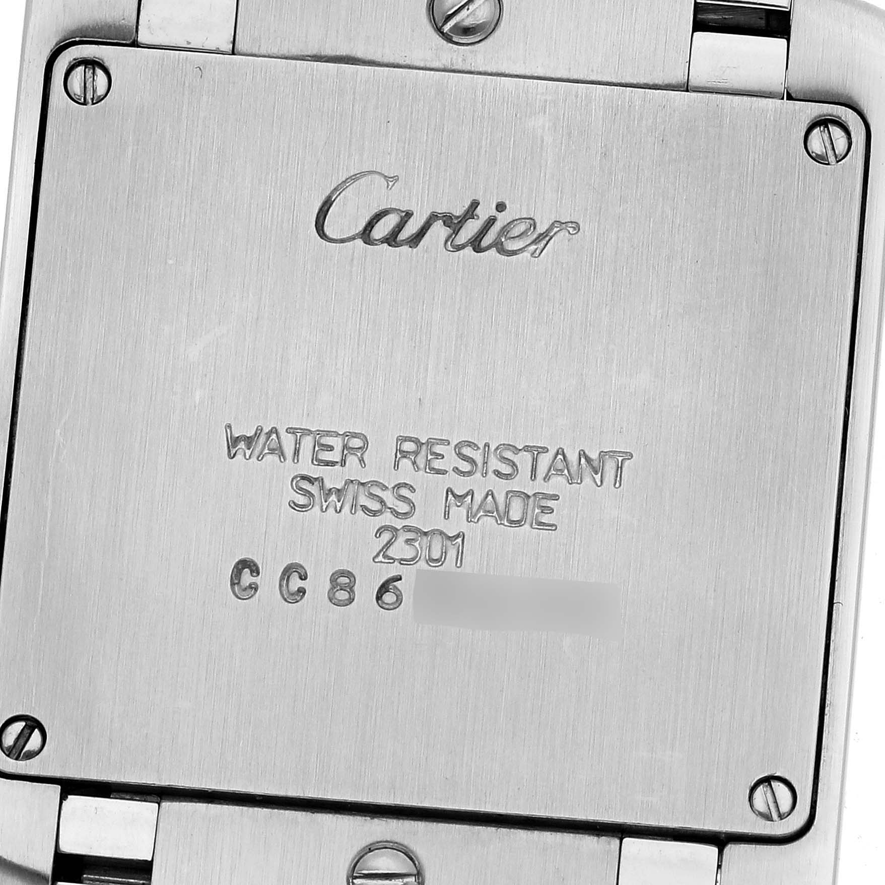 The image shows the backside of a Cartier Tank Française watch, highlighting the brand engraving and water resistance details.