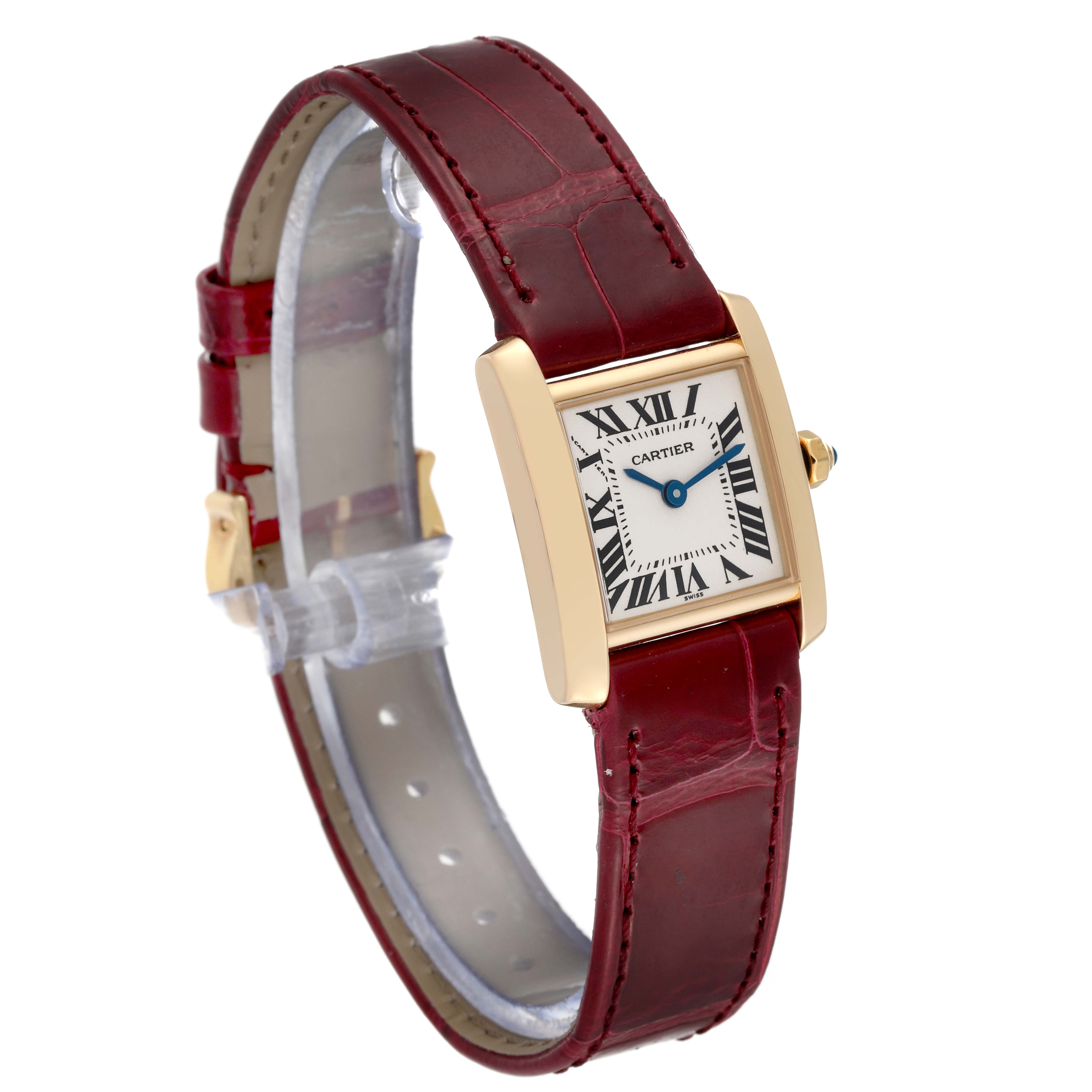 The Cartier Tank Francaise W5000256 Women's Yellow Gold Silver Dial W5000256 Women's Yellow Gold Silver Dial watch is shown from a three-quarter angle, displaying its red leather strap and rectangular gold case with Roman numeral dial.