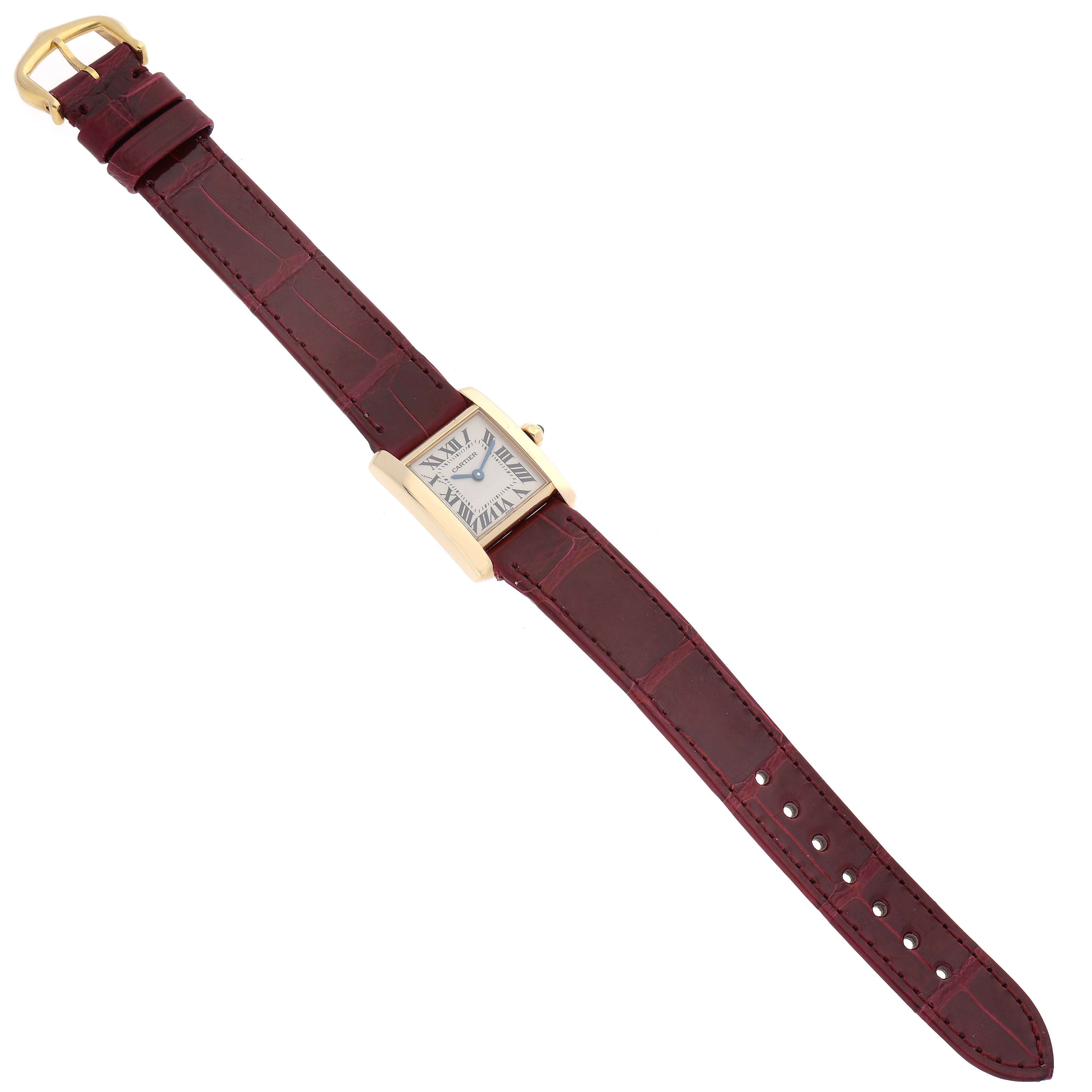 The image shows a Cartier Tank Francaise W5000256 Women's Yellow Gold Silver Dial W5000256 Women's Yellow Gold Silver Dial watch from a top-down angle, featuring its dial, case, and burgundy leather strap.