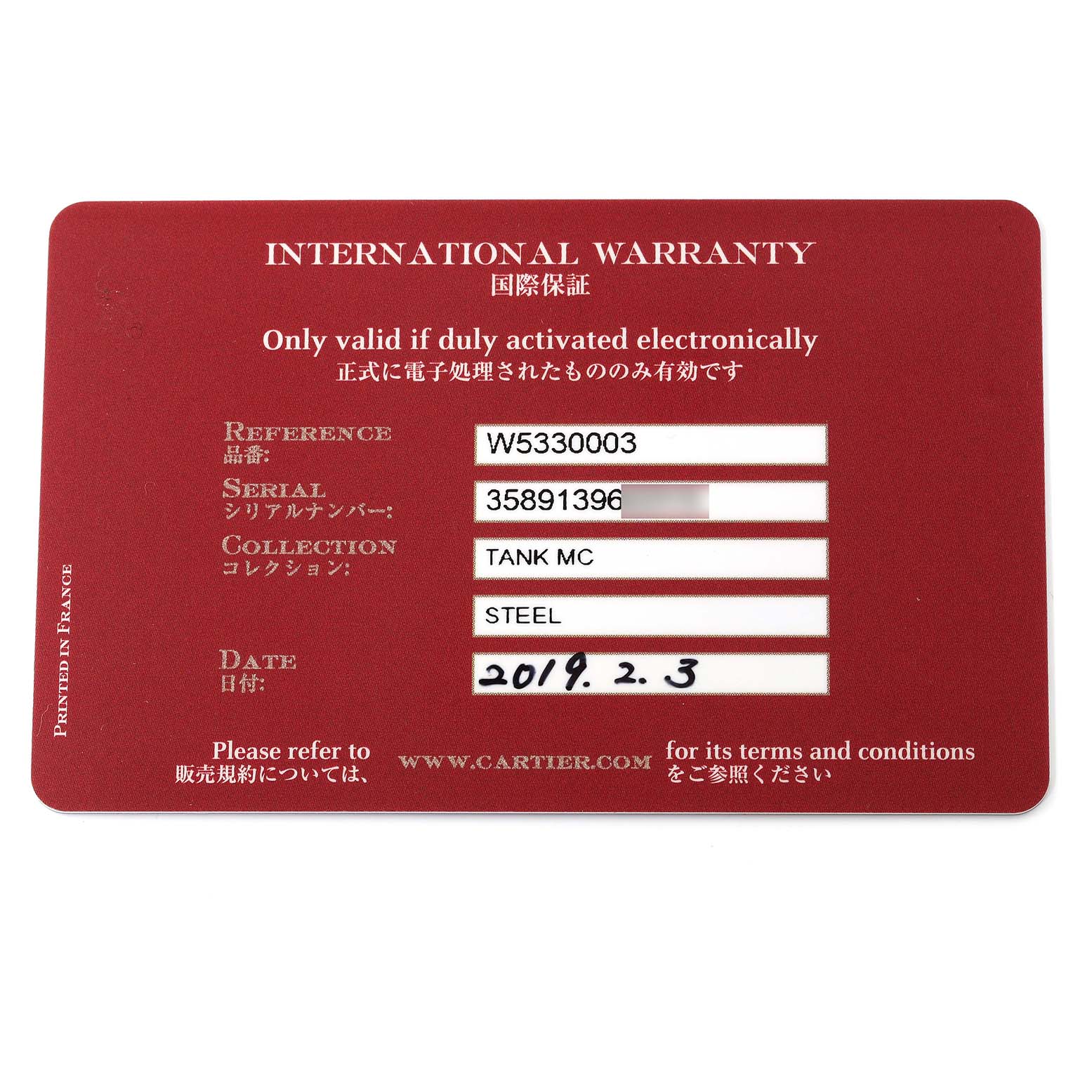 The image shows the international warranty card for the Tank MC model by Cartier, providing reference, serial number, and date of purchase.