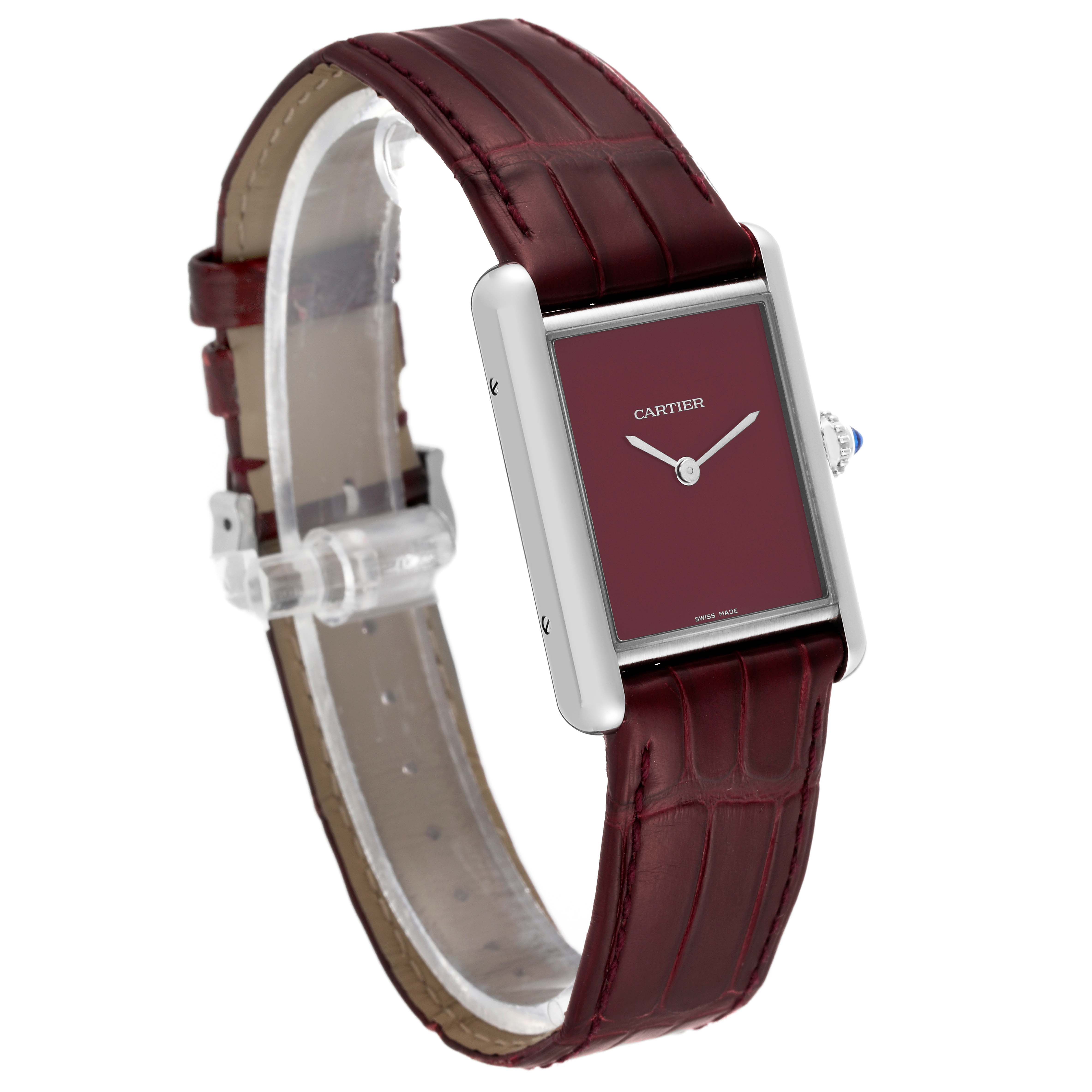 The Tank Must model by Cartier is shown at a slight angled view, displaying both its face and leather strap.