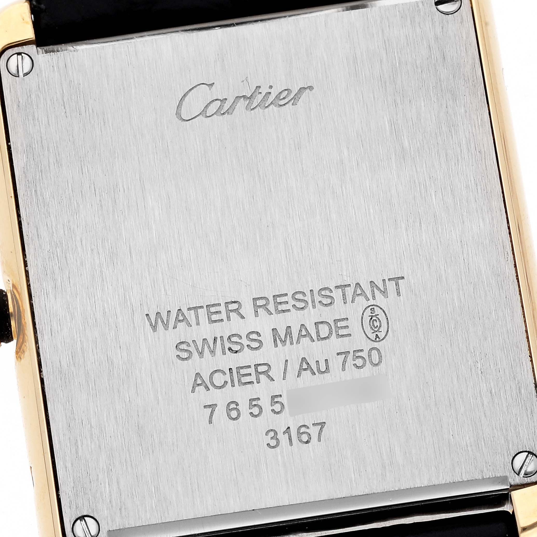 This image shows the back case of a Cartier Tank Solo W5200004 Men
s Steel and Gold (two tone) Silver Dial W5200004 Men
s Steel and Gold (two tone) Silver Dial watch, featuring engravings about water resistance and material details.