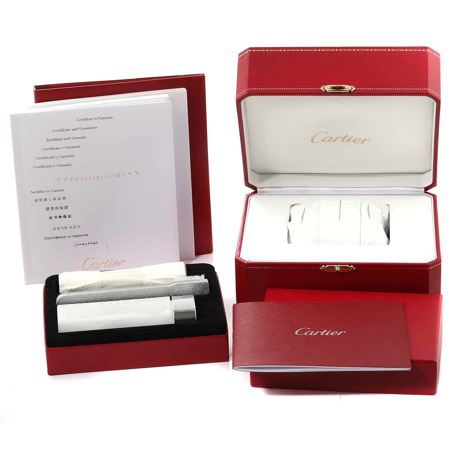 The image shows the packaging and accessories for a Cartier Tank Solo W5200013 Women
s Stainless Steel Silver Dial W5200013 Women
s Stainless Steel Silver Dial watch, including a red box, documents, and a cleaning kit.