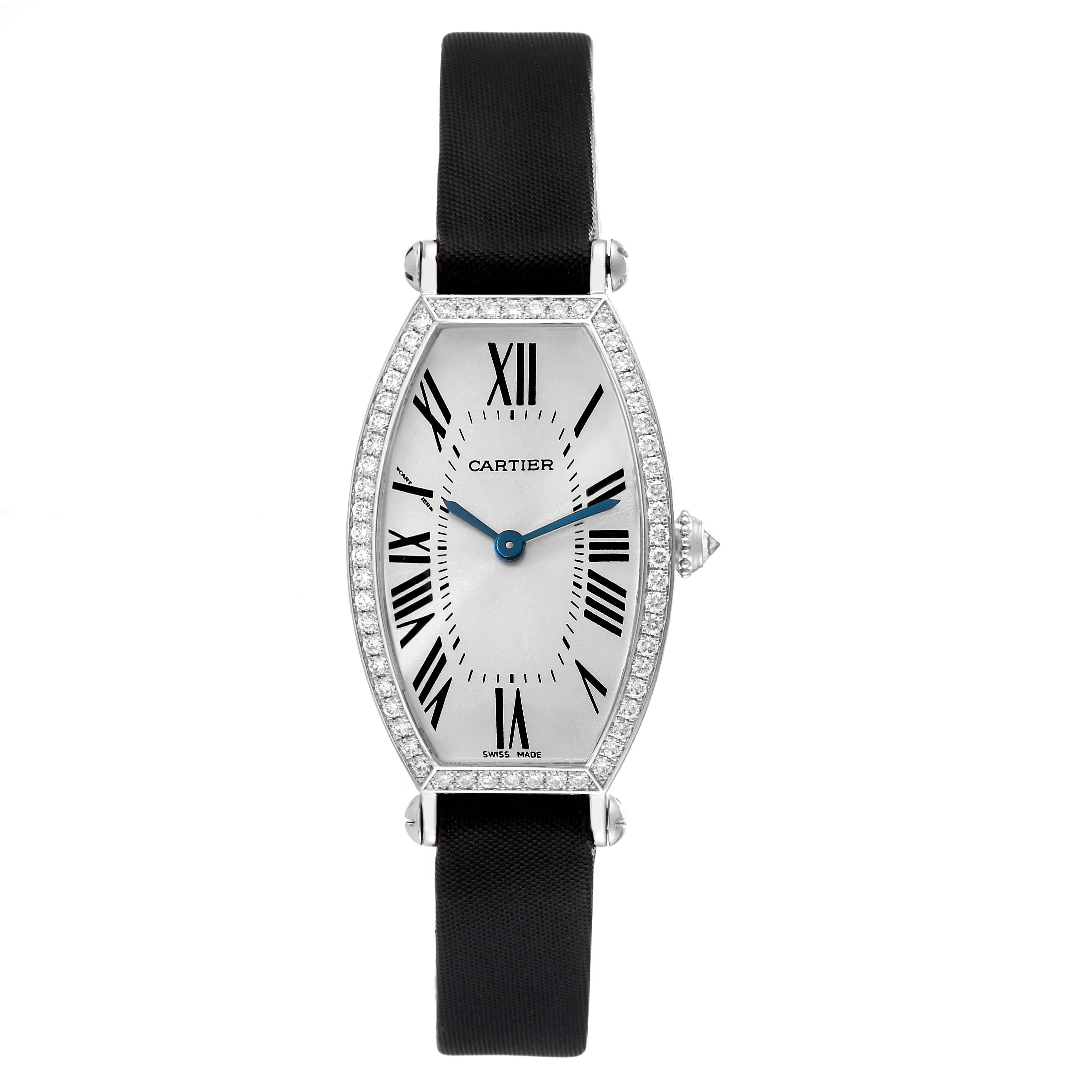 The image shows a Cartier Tonneau WE400131 Women
s White Gold Silver Dial WE400131 Women
s White Gold Silver Dial watch with a front view, displaying its face, bezel, and strap.