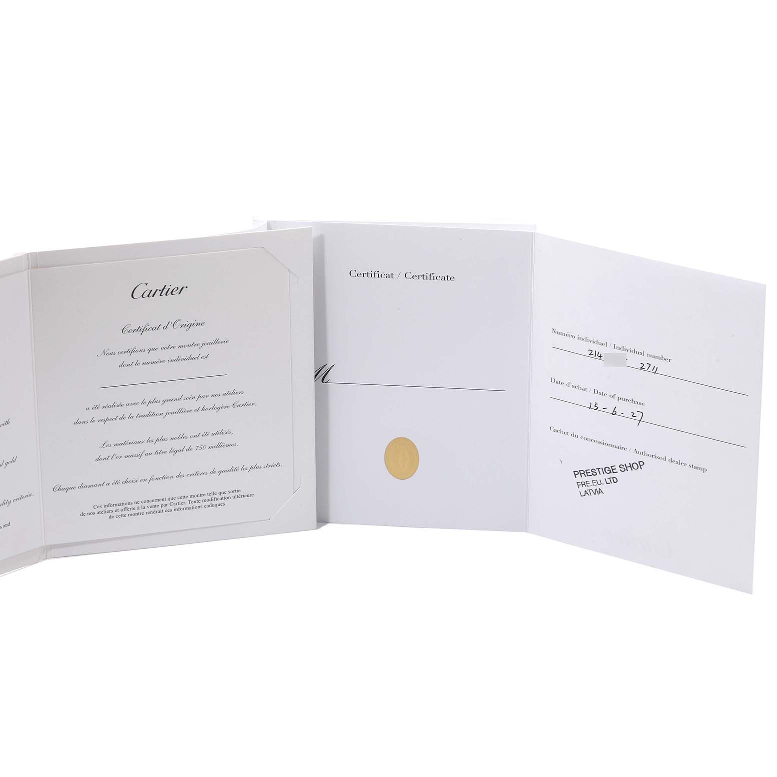 The image shows the open certificates and warranty documents for the Cartier Tonneau WE400131 Women
s White Gold Silver Dial WE400131 Women
s White Gold Silver Dial model watch.