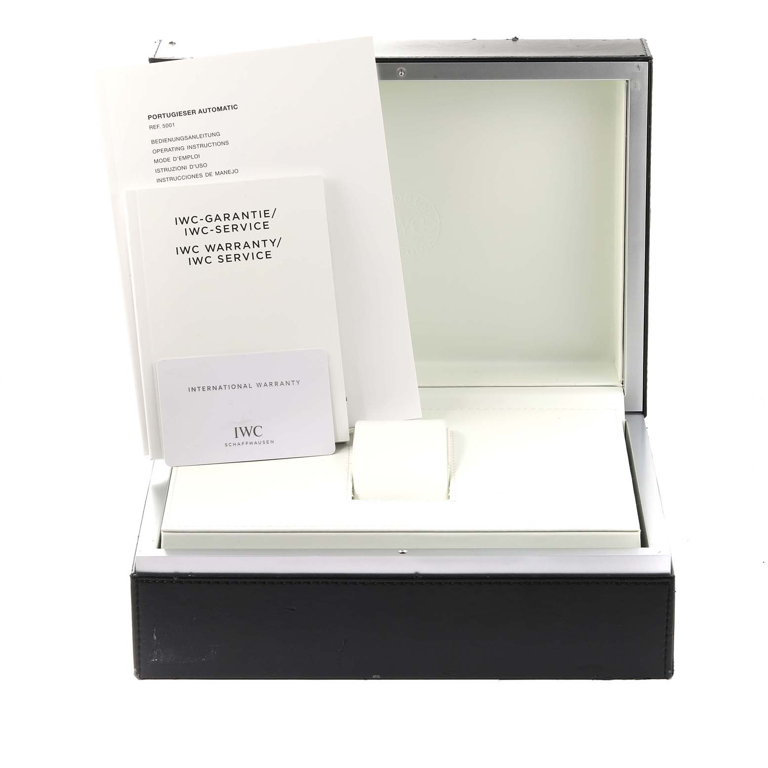 The image shows the packaging, warranty booklet, and documents for the Portuguese model by IWC.