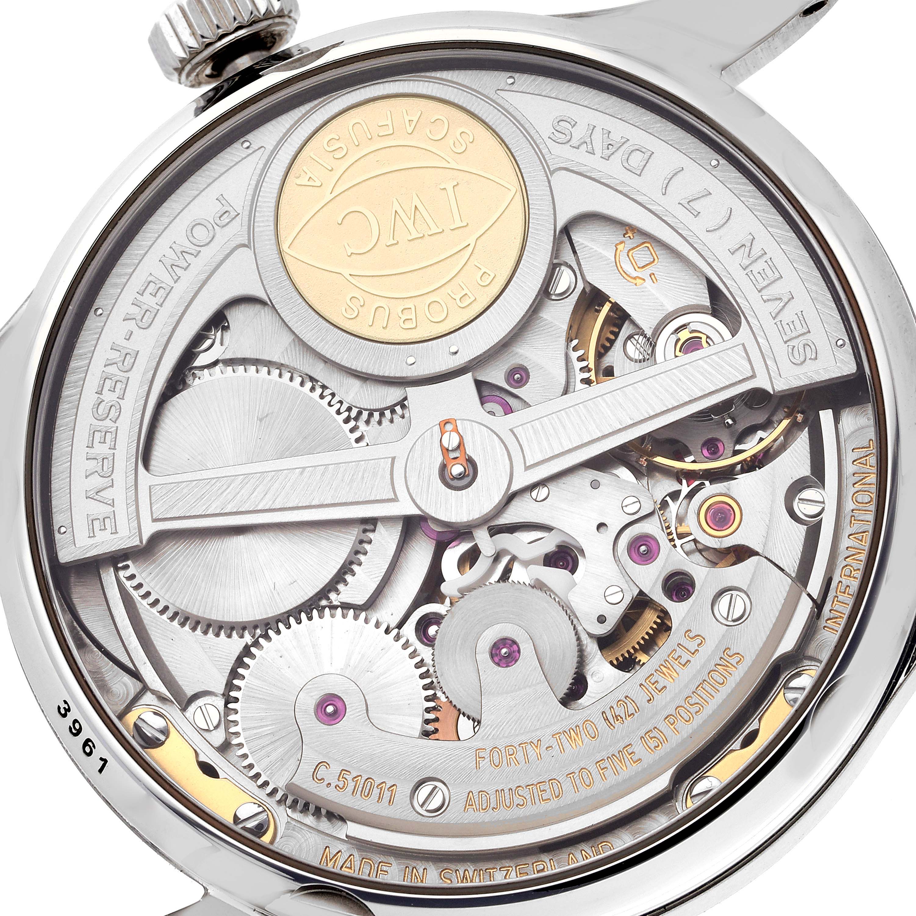 This image shows the back view of an IWC Portuguese IW500107 Men's Stainless Steel Silver Dial IW500107 Men's Stainless Steel Silver Dial model watch, revealing its intricate mechanical movement and components.