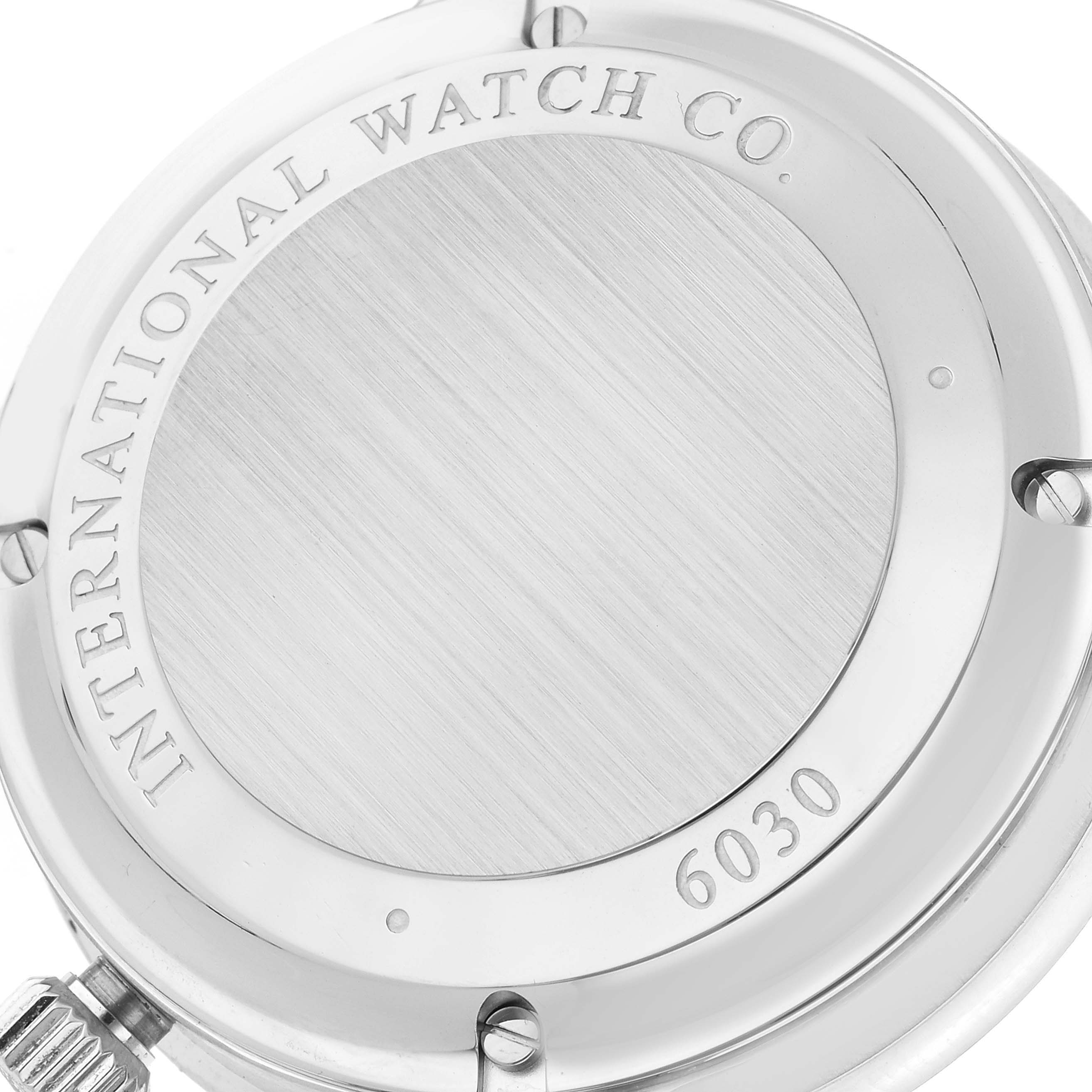 The image shows the back case of the IWC Portuguese IW371446 Men's Stainless Steel Silver Dial IW371446 Men's Stainless Steel Silver Dial model watch, highlighting the inscription and serial number.